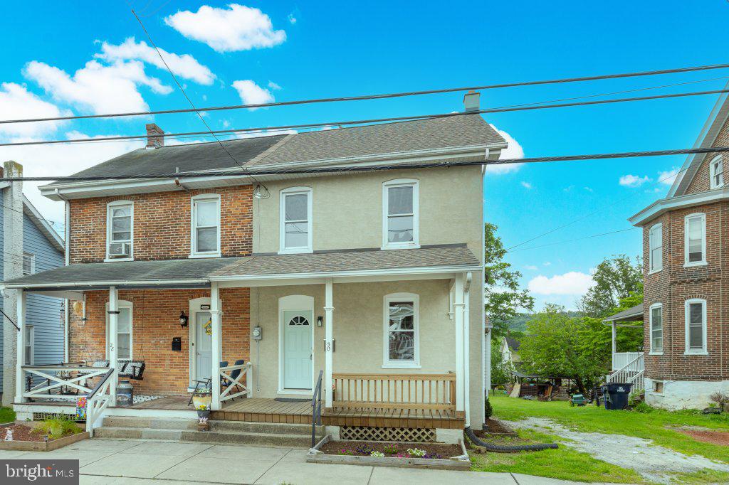 Newly renovated two-story townhome in Christiana. Totaling 1750 sq ft, 3 bedrooms, 1 bathroom. Home has been completely updated. Beautiful new kitchen with new cabinetry, flooring, new sink, countertops, new appliances, while preserving charm with exposed brick. Open, sunny floor plan with living room and formal dining room area with built-in shelving. New sunroom off kitchen has new flooring, sliding glass door, and windows. Sunroom leads to new deck and backyard. Second floor consists of 3 bedrooms. Third bedroom is a loft bedroom with additional closet space. Second floor bathroom is newly updated with vanity, flooring, and toilet. Other upgrades include new deck with fresh stain, new roof (2025), new paint and flooring throughout, replacement windows, new propane furnace and central air (2025). New kitchen with new appliances. New front porch and railing. All new refacing of home. Lovely flat backyard with privacy. Great Christiana location in Octorara School District.
