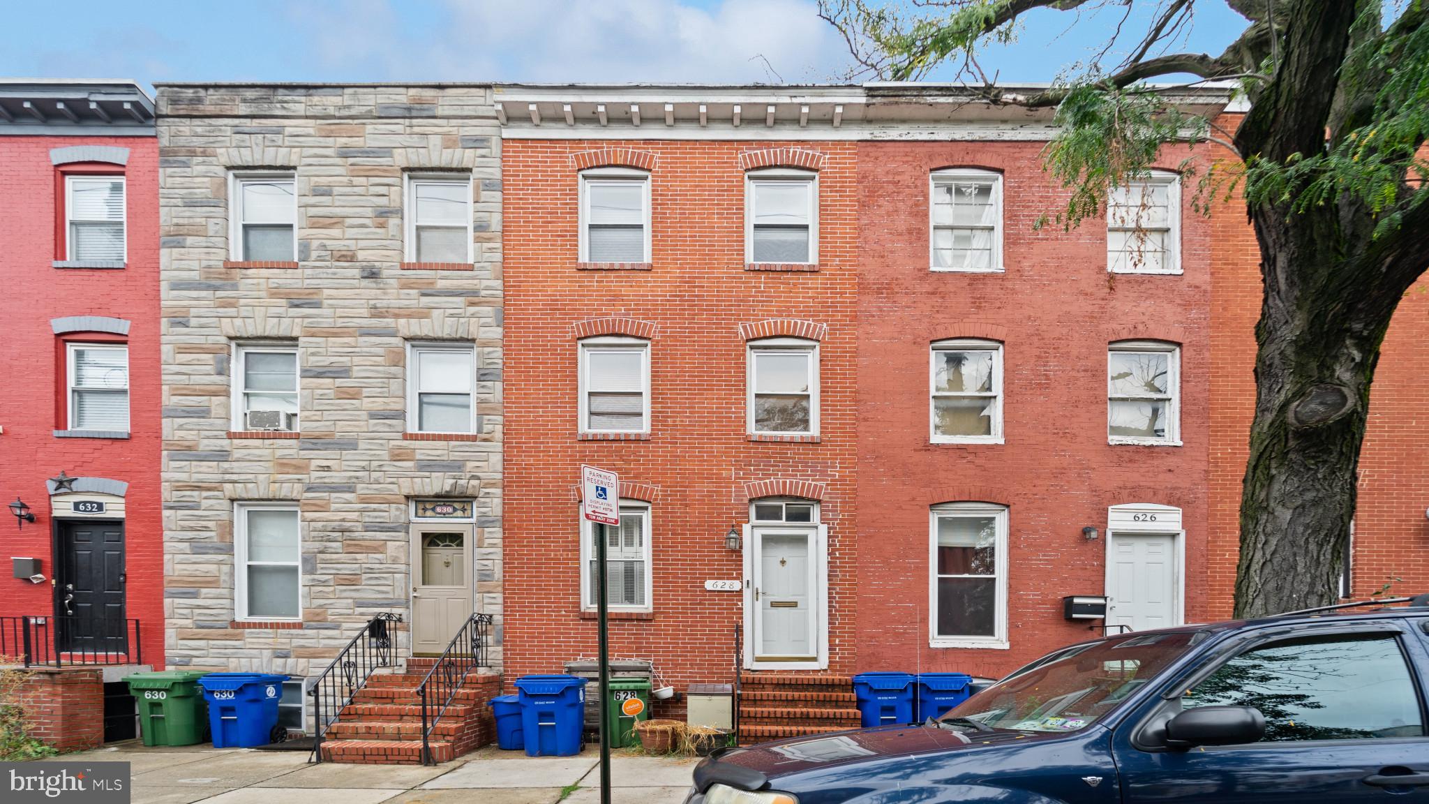 Welcome to this beautifully renovated 3 bed, 2 bath, 1,800 square foot historic row home in Pigtown/Washington Village! Exposed brick walls, crown molding, gas fireplace, hardwood floors, stainless appliances, and upper level laundry! This home is move-in ready with three carpeted bedrooms, two tiled bathrooms with walk-in shower and Jacuzzi tub in master bath. Outdoor main level deck/pergola and patio area with a privately fenced backyard. Two level rooftop deck with panoramic views that include the stadiums and City skyline. True Baltimore Charm! Conveniently located just off I-95, BW Parkway, MLK Jr. Blvd. and Russell St. Just a short walk to Camden Yards, M & T Bank Stadium, MARC train, Horseshoe Casino and U of M Medical Center. Minutes from the Inner Harbor, Aquarium, Federal Hill, Harbor East, Fells Point and more! Schedule your tour today!