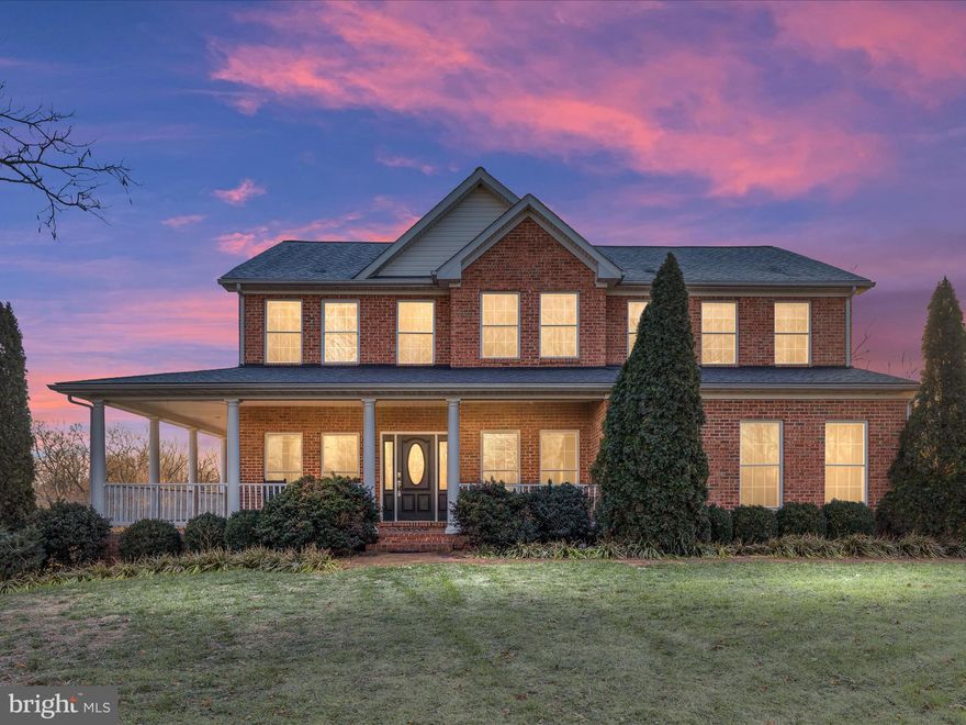 This stunning custom-built all-brick Colonial offers timeless elegance and modern comfort in a highly sought-after location. 
The main level features an open floor plan with Pergo wood flooring, a formal living and dining room, and a family room with a floor-to-ceiling stone gas fireplace. The kitchen is a chef's dream, boasting Corian countertops, a large island, stainless steel appliances, plenty of table space, and a pantry for added storage. The adjacent light-filled morning room with vaulted ceilings and an electric fireplace creates a cozy retreat, while a dedicated office or optional main-level bedroom offers flexibility.
Upstairs, the upper level includes a primary suite with a custom walk-in closet and an en-suite bathroom featuring a soaking tub, separate shower, and dual vanities. Additionally, there are three more spacious bedrooms and a full bathroom with dual vanities, offering ample space for family or guests. A large laundry room on this level adds convenience for busy households.

The fully finished basement is designed for entertainment and functionality, featuring a large rec/family room, space for a hobby area or additional bedroom, a full bathroom and unfinished space for another room or storage. A separate room with a bar area and durable tile flooring offers an excellent space for hosting guests, with direct access to the in-ground 5' fiberglass saltwater pool—an ideal setting for seamless indoor-outdoor entertaining.

The exterior of the home is equally impressive, with a front porch, a rear composite deck, and a stone/paver patio surrounded by well-maintained landscaping. The aluminum-fenced backyard offers space for outdoor activities. Additional highlights include a 2-car garage and a storage shed.

Other features include an active radon mitigation system, a water softener, ceiling fans throughout the home, tile flooring in the bathrooms, and crown molding accents.

Don’t miss this incredible opportunity—schedule your showing today!