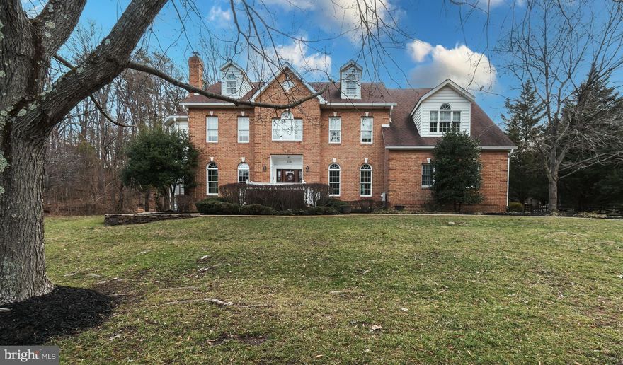 One of the largest and nicest homes in Eagles Passages!  This custom home is finished on 4 levels, located on a flat open lot  with open space to the side and rear.  Large gourmet kitchen with  island and updated appliances. There are two staircases leading to the second floor bedrooms. Primary bathroom is completely remodeled with a luxurious shower and Jacuzzi tub!  The top floor is finished with a possible in-law  suite featuring living room, 5th bedroom and private bath. Lower level is fullly finished with a office, full bath, bar and an amazing entertainment area featuring a stage and 120 inch screen with HD projector!  The flat open backyard features a lighted sport court for basketball, pickleball, street hockey, etc... All major systems have been well maintained/updated including the roof!  Eagles Passages amenities include community pool, tot lot, fishing pier and pavilion. Great Davidsonville Schools and an easy commute to Annapolis, DC and Baltimore!