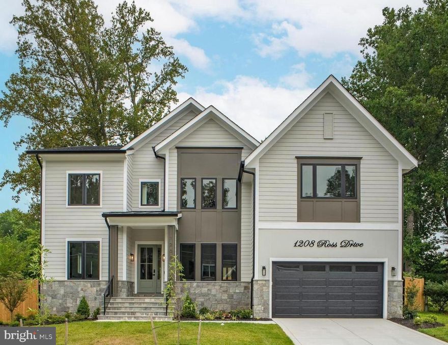 Exquisite open concept living redefined in this sleek and sophisticated modern design by Bella Home Construction -  offering 6 Bedrooms, 6 Full Baths and a Half Bath across 6,466 square feet of three finished levels on a beautifully landscaped 0.24-acre lot.
From the moment you arrive, a charming front porch welcomes you into a dramatic, light-filled open layout featuring 7.5” wide European oak floors, 6" Baseboard, 10 ft ceilings on the main level, 9 ft upper level and lower level. Rich wood accent walls add warmth and texture throughout.
The main level boasts a beautiful formal dining room, a versatile office or guest suite with en-suite bath, a sunlit breakfast area, and a covered deck and patio that flows seamlessly from the family room—perfect for indoor-outdoor entertaining. The expansive family room features 3 tray ceilings with LED lighting, gas fireplace and it opens to a chef’s dream kitchen, complete with a massive quartz island, luxury top-of-the-line stainless steel Jenn-Air appliances, under cabinet and floor lights, butlers pantry and a walk-in pantry. Convenient mudroom and the posh doggie spa bath center with access from both the kitchen and car garage.
On the upper level retreat, the lavish primary suite is a true sanctuary with heated floor in the spa bath, a spectacular 2-person rain shower enclosed by a heavy-duty frameless glass door , a free standing oversized 72” soaking tub , double vanities, a dedicated makeup area and  2 oversized custom walk-in closet.  Three additional bedrooms—each with its own en-suite bath. Enjoy the convenience of a spacious, dedicated laundry room on the upper level—designed with functionality and ease in mind.
The lower level is an entertainer’s dream, offering a spacious recreation room with fireplace, wet bar, private home theater, fitness room, private guest suite with en-suite bath and side sliding glass door entrance to yard. Great setting for an extended family member or au pair.  
Enjoy outdoor dining and entertaining in the fully fenced backyard, featuring covered patio off the family room and kitchen. Expansive glass sliding doors and windows inviting abundant natural light. 
Additional features: Dual zone HVAC,  2-car garage with an EV charger, CAT-6 wiring throughout for high-speed internet. This home is built with energy-efficient design and smart home infrastructure.
A commuter’s dream! Enjoy quick access to Washington D.C, McLean, Arlington, Falls Church, Tysons and Dulles. Close to Dunn Loring metro! Conveniently located  inside the beltway to  I-495, I-66, Route 7, GW Parkway, the Dulles Toll Road. Nearby to Tysons Corner, Shops, Restaurants, Movies.