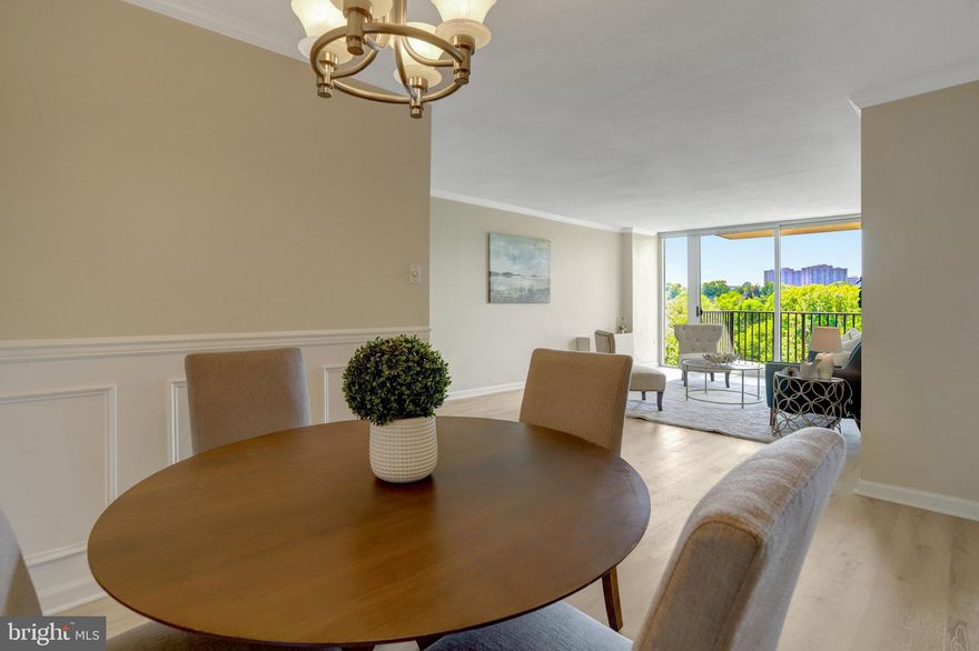 ALL UTILITIES INCLUDED in the condo fee plus 2 parking permits. The building offers fantastic amenities like a 24-hour front desk, pool, fitness center, recreation room, party room & multiple laundry rooms per floor AND is located across from the popular W&OD bike trail! Nearby is the Ballston Corridor, Shirlington Village, and Columbia Pike, with easy access to Amazon HQ2 and Reagan Airport via nearby bus routes. Completely updated and move-in ready INCLUDING BRAND NEW HIGH END WINDOWS AT AN EXPENSE OF MORE THAN $20K - take this expense off your list of worries!!!! This spacious condo at The Carlton features is TOTALLY UPDATED TOP to BOTTOM incl all new doors, flooring, crown molding, and wainscoting. The open floor plan includes a large living and dining area, plus an updated kitchen with soft-close cabinetry and a large pantry. Floor to ceiling windows & glass doors flood the space with natural light & stunning tranquil views of Four Mile Run Stream and the skyline PLUS SUNSET VIEWS EVERY NIGHT. Enjoy a private balcony with serene sounds of nature, especially the running water of Four Mile Run Stream.  Don’t wait – this gem will move fast!
