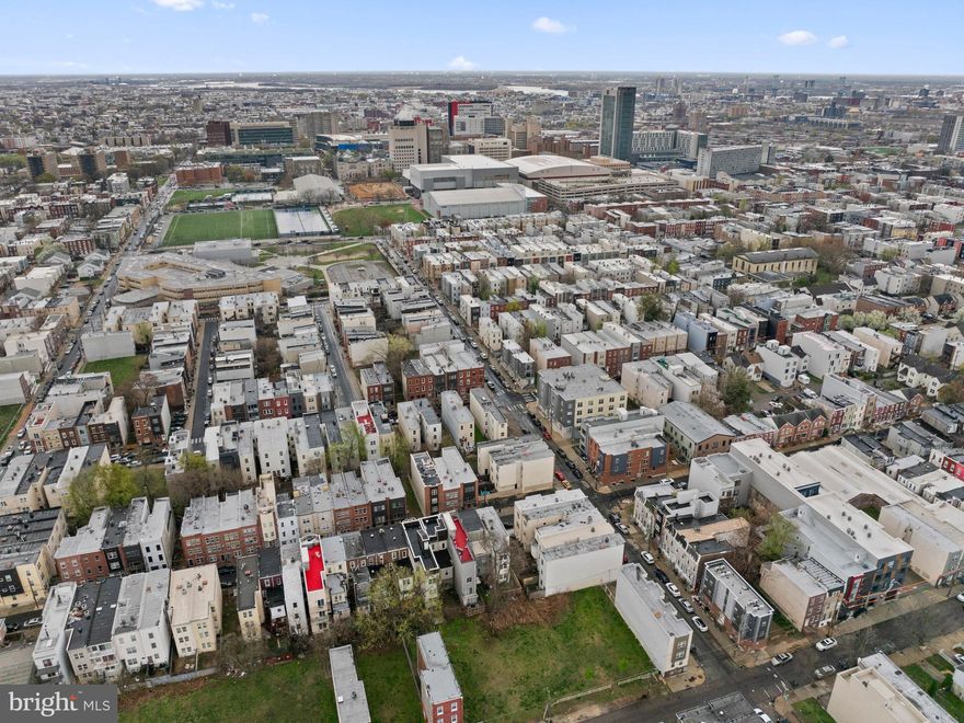 Unlock the full potential of your portfolio with this turnkey, income-producing duplex just three blocks from Temple University’s Main Campus. 1910 N Gratz Street features two spacious, modern bi-level apartments totaling 7 bedrooms and 4 full baths, ideal for student housing or long-term rental income. Unit A is a tri-level, 4-bedroom, 2-bath apartment currently vacant and recently renovated — providing opportunity for owner-occupancy or a rent increase. The layout offers an open-concept living and kitchen area with stainless appliances, a large bedroom and full bath on the main level, two spacious bedrooms upstairs, and a lower level with an additional bedroom, full bath, laundry, and storage. Unit B is a bi-level, 3-bedroom, 2-bath apartment, recently leased to a Section 8 tenant for $1,700 per month through May 2027 (tenant pays $50–$60 monthly for water). It features a bright living room, a modern kitchen, in-unit washer and dryer, and a private rear yard—a rare bonus in this location. Each unit offers generous square footage, separate utilities, and contemporary finishes that attract stable tenants and strong cash flow. Conveniently situated between W. Berks St. and W. Norris St., steps from Broad Street, the subway, Temple University, shops, and public transit, this property combines prime location, proven income, and long-term appreciation potential. An exceptional opportunity for both seasoned investors and first-time multifamily buyers seeking a high-performing asset in one of Philadelphia’s most active rental markets.