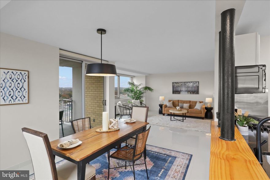 Welcome to a sophisticated urban living experience in #1605 at The Fountains in Alexandria. This exceptionally updated and stylish 1,225 sq ft condo boasts a seamless blend of modern luxury and stylish features - Easy, elegant one-level living at its finest. With 2 spacious bedrooms and 2 beautifully renovated bathrooms, this condo is designed for comfort with all of the modern conveniences. The primary ensuite bathroom and a newly renovated open kitchen exemplify elegance, complemented by newer oversized windows fitted with smart electronic silhouette blinds operated by remote control, flooding the space with natural light.

The interior features exquisite marble floors and tile baseboards throughout, enhanced by recessed and stylish lighting, creating an ambiance of refined sophistication with gas cooking, wine refrigerator as well as a built-in kegerator. The updated kitchen is perfect for culinary enthusiasts, while the open-concept living area extends effortlessly to a private balcony through the newer sliding glass doors, ideal for enjoying the outdoors and serene views. Additional updates include fresh paint throughout, newer windows and balcony sliding door, plus all newer HVAC convectors for year-round comfort. Added convenience of a deeded garage parking space and an additional storage area.

Residents at The Fountains enjoy a wealth of amenities, including a pool, barbecue area, common courtyard, and a fitness room. Convenient common laundry is on the same floor (16th) - Seller also offers to credit buyer for an all-in-one washer/dryer unit with a strong offer! The building features an outdoor pool, indoor sauna, bike storage, party room, and tennis court for an active lifestyle. With a front desk/concierge service and secure grounds, peace of mind is ensured. 

With great commuting options and around the corner from the new state-of-the-art medical campus Inova Healthplex at the former Landmark Mall site you'll also discover an array of dining and shopping options all just a stone's throw away. Embrace the vibrant community and luxurious amenities that make #1605 in The Fountains an exceptional place to call home.