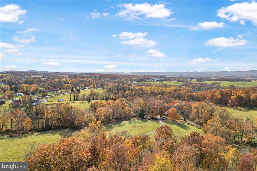 An exceptional opportunity awaits to secure a highly private and expansive 1.33-acre parcel of land in the desirable Walkersville area of Frederick County. Tucked away on the scenic Water Street Road, this substantial acreage serves as the possible perfect canvas for those seeking to build a custom dream estate with maximum seclusion. The land is characterized by its natural setting, offering a peaceful, wooded environment that provides a generous buffer from neighbors and is ideal for creating extensive gardens, an equestrian property, or simply enjoying the outdoors. Best of all, there is no restrictive Homeowners Association (HOA), granting you complete freedom to design and develop the property exactly to your specifications. Though enveloped in country tranquility, the lot remains conveniently located, offering a straightforward commute to the amenities, dining, and job centers of Downtown Frederick. This rare offering of large acreage in a prime location within the excellent Walkersville school district represents a significant investment and a limitless opportunity to build your future.