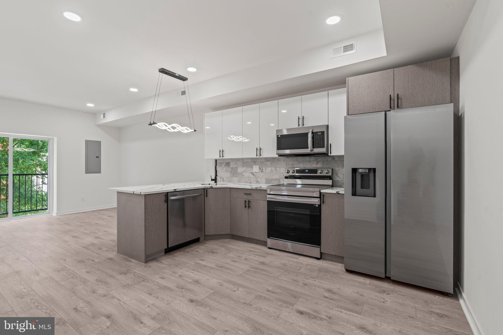Welcome home to your beautifully designed 3-bedroom, 2-bathroom bi level home, which offers the perfect blend of modern elegance and urban convenience. Walk into an open-concept living space with high ceilings and ample natural light. The contemporary kitchen has quartz countertops, stainless steel appliances and shaker cabinetry. Right off the living space is access to a juliet balcony creating the perfect portal for natural light. There are three spacious bedrooms, each with generous closet space. The primary bedroom has an ensuite bathroom. Sleek, modern bathrooms with premium finishes, in-unit washer and dryer, central air, and energy-efficient systems. Your unit extends to a roof deck perfect for taking in the approaching summer days or decompressing with the view of an afternoon sunset. Located just blocks from Temple University, SEPTA transit, dining, shopping, and more. Schedule your private tour today to come see your new place to call "home". Pets are welcome. Dogs must be under 25lbs. ( $500/dog and $250/cat deposit). Building is fully electric so tenant will have NO gas bill. $45/mo flat water fee (NOTE: Pictures show some virtual staging)
Rental requirements below:
1) first and double security to move in.
2) $45 non refundable application fee per applicant for credit and background check.
3) must be able to provide proof of net income of at least three times the monthly rent.
4) minimum 600 credit score.
5) All persons over the age of 18 must complete a rental application.