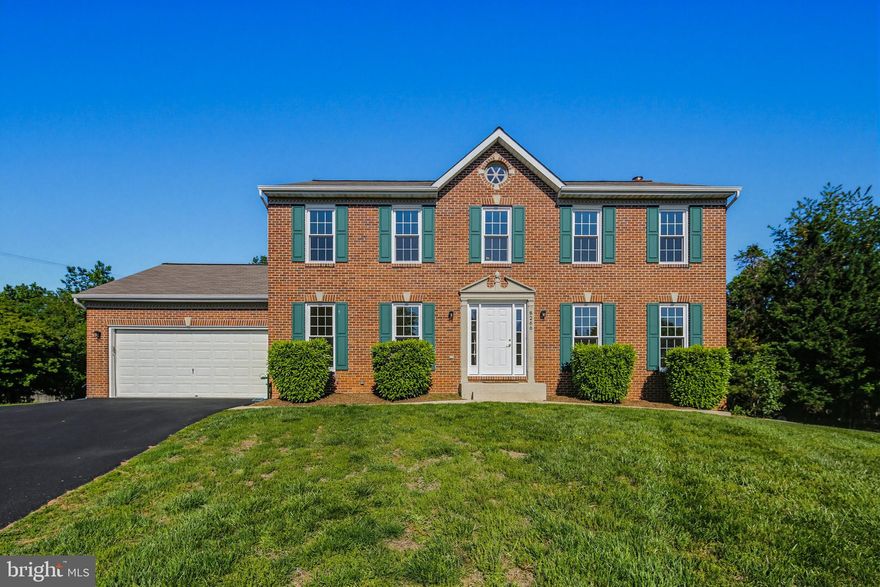 Priced to sell! Beautifully maintained 4 bedroom, 3.5 bathroom, offering over 3,500 finished living space is ready for its next lucky Owner! This stately brick Colonial is situated at the end of a cul-de-sac in the lovely neighborhood of Patuxent Springs. Step inside the impressive two story foyer and discover hardwood flooring throughout the entire main level, complemented by ceramic tile in the powder room. The spacious and sun-filled living room showcases a large bay window and elegant crown molding. The formal dining room features crown molding, chair rail molding and a French door leading to the kitchen. The updated kitchen is equipped with granite countertops, a center island with a cooktop and additional cabinet storage, double wall ovens and abundant cabinetry. The adjoining breakfast room flows seamlessly into the inviting family room, complete with a wood-burning fireplace featuring a marble surround and wood mantle. A convenient laundry closet and half bathroom complete the main level. Upstairs, brand new carpet extends throughout the upper level (2026), which includes all four generously sized bedrooms and two full bathrooms. The expansive primary suite boasts a cathedral ceiling, walk-in closet and private ensuite bathroom with a double sink vanity, soaking tub and tiled shower stall. Bedrooms 2-4 are all sizable and share a well-appointed hall bathroom with tub shower. The fully finished walkout lower level offers exceptional flexibility and is ideal for an in-law or au pair suite. This level includes a large recreation room, full kitchen, full bathroom and two additional rooms that can serve as guest rooms, office, fitness room or hobby spaces to suit your needs. Step directly outside to the patio and backyard from the lower level. Enjoy the outdoors on the large back deck featuring stairs down to the patio, plus expansive front and back yard space perfect for entertaining, play or relaxation. Improvements & updates include: 2026 – All Windows Replaced, 2026 – Whole House Interior Painting, 2026 – Back Deck Repainted, 2026 – Front Door & Side Lights, 2026 – Double Wall Ovens, 2026 – Cooktop, 2026 – Dishwasher , 2026 – Clothes Washer & Dryer, 2026 – Both Sliding Glass Doors, 2026 – Microwave in Lower Level Kitchen, 2026 – Siding, Sidewalks & Patio Power Washed, 2024 - Carpets On Upper & Lower Level, 2016 – Water Heater, 2014 – Roof, Gutters & Skylight, 2014 – HVAC. Howard County Public School System! Minutes from Maple Lawn’s shopping, dining and entertainment! Ideal for commuters with easy access to I-95, Route 29 and Route 32, offering convenient travel to Baltimore and Washington, D.C. One year home warranty included for the Buyers! This stunning home combines space, comfort, and versatility in a beautiful neighborhood setting —book your showing today!