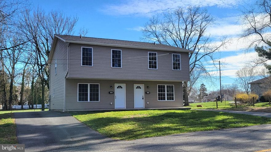 Affordable & Move-In Ready Duplex – Like New Inside & Out!    Enjoy easy living in this beautifully refreshed duplex featuring 3 bedrooms and 1.5 baths. The interior has been freshly painted and updated with brand-new flooring and appliances, giving the home a modern, move-in ready feel.    The main level offers convenient laundry, a spacious layout, and comfortable living areas. Stay comfortable year-round with efficient electric heat and central air.   Step outside to a rear patio—perfect for relaxing or entertaining. The home also includes low-maintenance vinyl siding, off-street parking, and public water and sewer for added convenience.   Ideally located on the edge of town, you’ll appreciate quick access to shopping, dining, and major interstates. A newer roof (2005) adds peace of mind.   
Affordable, low-maintenance, and ready for its next owner—don’t miss out! Call today to schedule your showing.