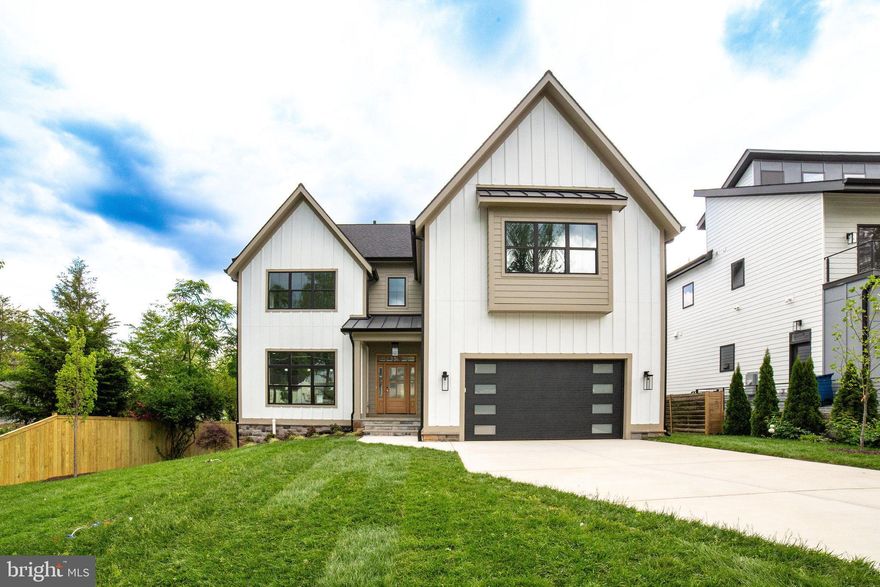 Welcome to 2003 Nordlie Place, where luxury meets functionality in this thoughtfully designed home.  This brand-new, 6-bedroom, 6.5-bathroom contemporary craftsman-style residence boasts over 5750 finished square feet, offering an unparalleled blend of elegance and practicality.  Aside from the deck, the price is all-inclusive—with no additional costs.
From the moment you arrive, you'll be captivated by the home's timeless board and batten siding, covered front entry, and stunning 5-inch solid red oak flooring. Step inside the main level to experience an inviting open floor plan with soaring 10-foot ceilings. A versatile main-level office or bedroom, complete with a private full bath, provides flexibility to accommodate your needs. The gourmet chef's kitchen, featuring premium Café and Fisher and  Paykel appliances, quartz countertops, and a spacious island, seamlessly connects to the great room and breakfast nook. A fireplace beautifully separates the formal dining area and great room, creating an atmosphere of warmth and sophistication. Just off the kitchen, a generously sized walk-in pantry and a functional mudroom enhance everyday convenience.
The second floor is a retreat in itself, highlighted by a luxurious primary suite with a tray ceiling, two expansive walk-in closets, and a spa-like bathroom. Indulge in the serenity of a standalone soaking tub, a custom-designed shower, and a dual-sink vanity. Three additional upper-level bedrooms each feature walk-in closets and en-suite bathrooms, while a well-appointed laundry room completes this level.
The lower level provides additional living space, featuring a large family room with a built-in wet bar and a convenient exterior walk out entrance. Two additional bedrooms, a full bath, and a sizable finished excercise area add to the home's versatility.
Located inside the Beltway in the sought after Pimmit Hills neighborhood of Falls Church, this residence provides easy access to major airports, Tysons, I-66, I-495, and the Dulles Toll Road. You’ll find an array of shopping and dining options nearby. Discover the perfect blend of luxury and practicality at 2003 Nordlie Place—a home designed to impress and built for modern convenience.

Photos are from another quality home built by Omni-Metro Homes. House is currently under construction with a June 2nd 2025 Delivery. Interior photos will be taken at completion of home. Come see it now, before it's GONE!