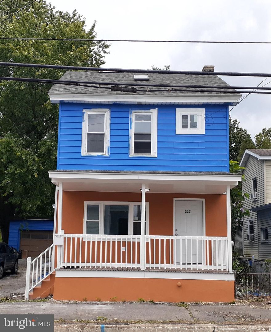 Recently renovated detached home in Tower City with 2 car garage and driveway parking.  Many windows are replacement windows.  Kitchen has tile flooring, new counters and backsplash.  There is a full bathroom off the kitchen ( shower, no tub ) and first floor laundry.  There is also a room which could be a 1st floor bedroom, office or game room for the kids.  Living room and dining room have new laminate flooring. The 2nd floor has  3 bedrooms and a full tile bath. The attic has been renovated into another bedroom with a skylight .  Each room has its own mini-split  AC / electric heat  system.  ( except DR )  There is lots of living space here , Call for your private showing today !!  Seller is a licensed NJ Realtor