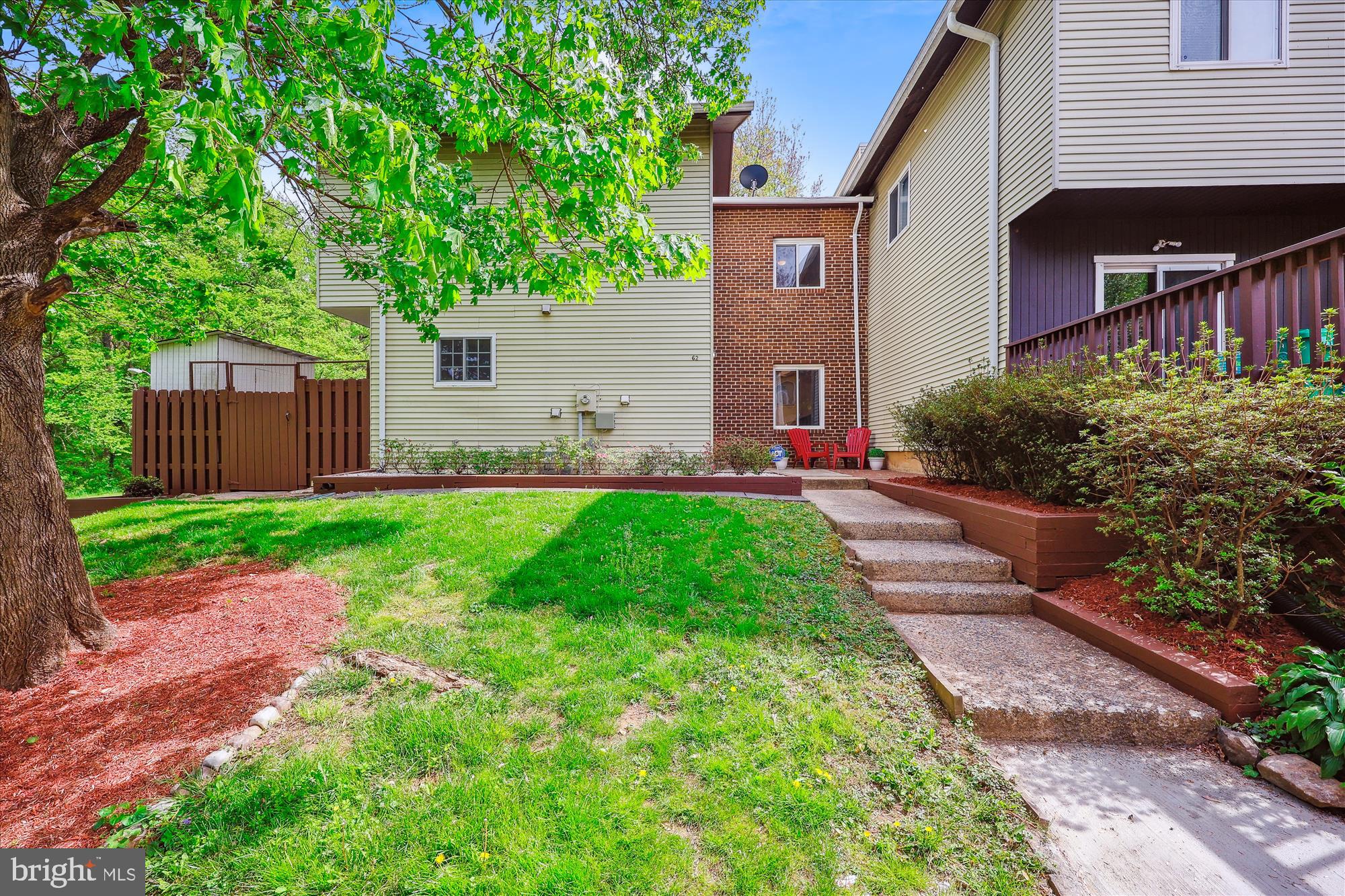 This 4-bedroom, 2.5-bath end-unit condo spans two levels, offering an ideal combination of comfort and convenience. The main level features gleaming hardwood floors, with a freshly painted living and dining area that welcomes natural light, creating a warm and inviting atmosphere. Step outside through the dining room and enjoy the peaceful retreat of your private, fenced rear deck that overlooks serene parkland—perfect for outdoor entertaining or quiet relaxation. Upstairs, the Owner’s bedroom boasts gorgeous views of the surrounding parkland and includes its own private bath, providing a tranquil and private retreat. Three additional bedrooms and another full bathroom offer ample space for family, guests, or a home office setup.
Just steps away from your door, you'll find easy access to nearby parks and walking paths, ideal for outdoor enthusiasts or those who enjoy a stroll in nature. The home is also conveniently located near schools, playgrounds, and major commuter routes, with the MARC commuter train and Metro stations just a short distance away, making your daily commute a breeze. Nearby Old Town Gaithersburg, Rio Lakefront and Downtown Crown provide an array of shopping, dining and entertainment options! The property also includes two reserved parking spots for added convenience. This rare end-unit condo is a perfect place to call home. New roof in 2021.