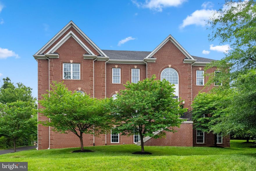Welcome home to this magnificent brick Colonial sited on a large 0.7-acre lot conveniently located inside the Beltway in McLean’s sought-after Chesterbrook/Longfellow/McLean High school district.  A splendid two-story foyer illuminated by a statement chandelier wows as a perfect prelude to a beautiful and bright interior offering over 8,000 SF of living space enriched by attractive amenities throughout: high ceilings on all three levels (10’ on main level,  9’ on upper and lower level), wood floors (no carpet), recessed LED lighting, dual staircases, deep molding, two laundry rooms with side by side front loading washer and dryer (one on the main level by the mud room and one on the upper bedroom level in the hall), ample storage with walk in closets in all bedrooms, bonus storage closet on the main level and 1,300 SF of storage space in unfinished portion of the lower level, two-story great room with coffered ceiling and a gas fireplace, gourmet kitchen with five-burner cooktop, roomy center island with bar seating and walk in pantry, elegant separate dining room, spacious breakfast room with French doors to the 400 SF deck for alfresco dining, upsized entry-level bedroom suite, corner office on the main level, sumptuous upper-level primary bedroom suite with a sitting room, two walk in closets with built in organizers, two separate vanities flanking the soaking tub and large walk in shower, additional two bedrooms with ensuite bathrooms and a hall bathroom with double vanity serving two more bedrooms on the upper level, large recreation room with a wet bar outfitted with two wine coolers, media room, guest/nanny suite with walk out entrance on the side, oversized 1,000 SF garage and more.  Superb location offers quick access to three metro stations within 5 miles, downtown D.C. and National Airport within 10 miles as well as abundant shopping, dining, recreational and entertainment delights nearby.  Pamper yourself with the rare treat of having this classy and impressively spacious turn-key home to enjoy!