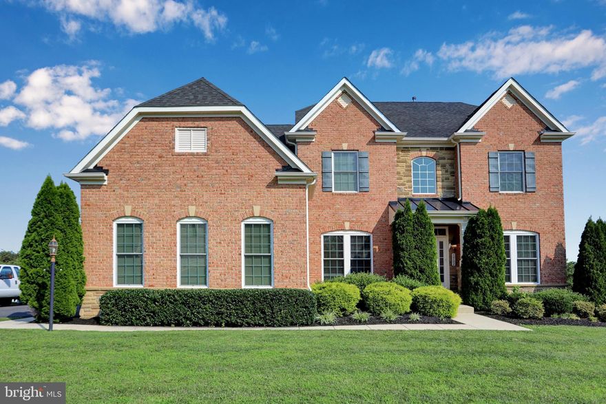 ABSOLUTELY AMAZING HOME W/ WATER VIEW, BRICK/STONE FRONT, ATTACHED 3 CAR GARAGE, 
IMMACULATE WITH THE FINEST AMENITIES. NICELY LANDSCAPED
MAIN FLOOR- HARDWOOD FLOORING, FAMILY ROOM, W/ FIREPLACE, LIVING ROOM, SUNROOM, FORMAL DINING RM, OFFICE, GOURMET KITCHEN
OPEN FOYER SHOWS OFF A ROUNDED STAIRWAY LEADING UPSTAIRS  4 BR'S,  2 BATHS,  LAUNDRY,  MASTER BR W/ LUXURY BATH, IMMACULATE CARPETING 
LOWER LEVEL BASEMENT- FULLY FINISHED WITH A  SECOND KITCHEN , BR, FULL BATH, LAUNDRY RM, SPACIOUS OPEN AREA W/DOOR OPENING TO BACKYARD. GREAT IN-LAW SUITE 
SPACIOUS DECK TO ENTERTAIN FAMILY AND FRIENDS
Open House- Sunday 12pm- 2pm

Click on Video Tour