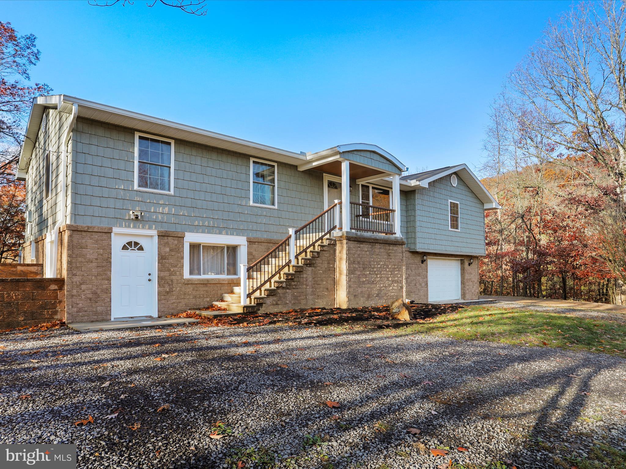 This charming and well-maintained home offers a perfect blend of comfort and privacy. Nestled on a double lot totaling 1.7 acres, this home features 4 bedrooms and 2 bathrooms on the main level, plus an additional bedroom and bathroom in the finished basement, there's plenty of room for everyone! Beautiful eat-in kitchen. The basement offers a 2nd living/rec room and has garage access. Step outside to enjoy the serene surroundings from the beautiful deck, ideal for relaxing or hosting gatherings. The property also includes a detached garage/building as well as a storage barn/shed containing the outdoor woodstove. With convenient proximity to ATK, UPMC Western Maryland, WVU Medicine, shopping and many local restaurants and chains, why would you want to live anywhere else?