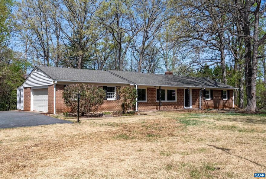 Enjoy one level living in this recently renovated and spacious brick rancher. Just minutes off of 29, this property offers a combination of quiet and convenience. Perfectly situated on a large one acre lot, this house is move in ready and beckons it's new owners. Recent improvements include all new LVP flooring and paint throughout, new stainless appliances and quartz tops on solid wood cabinets, new shower vanities, toilets in bathrooms, new HVAC, landscaping and lot improvements, and much more. Extra storage in sheds that convey as-is. Only 25 minutes to Charlottesville and UVA, minutes to NGIC, 15 minutes to the airport. Come see it today!