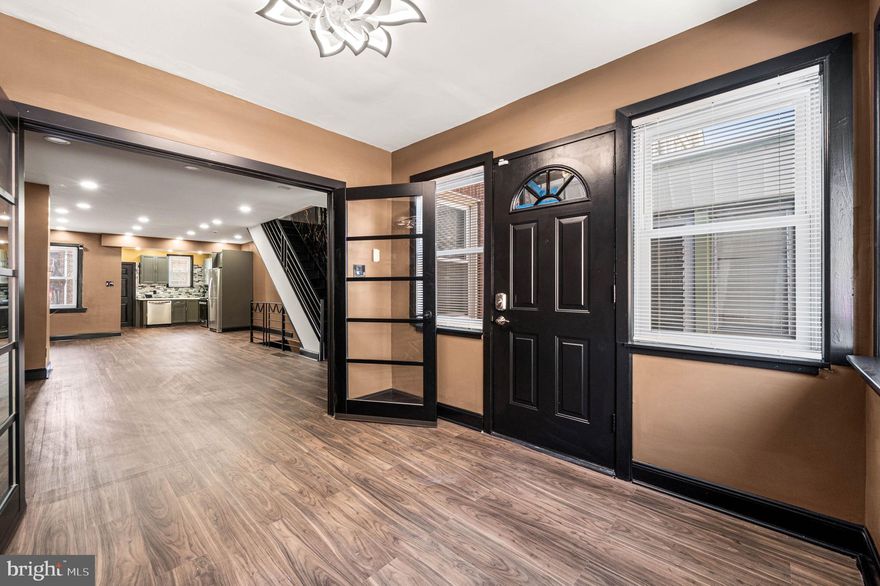 Welcome to this beautifully remodeled home designed to highlight its wide open floor plan and modern finishes. Enter through the foyer where elegant French doors lead into a spacious living room and dining room combination, creating a bright and inviting space perfect for entertaining. Continuing through the open-concept layout, you’ll find a stunning kitchen featuring granite countertops and brand-new appliances, offering both style and functionality. The home also includes a fully finished basement.  Every detail of this home has been thoughtfully designed and fully remodeled to combine modern upgrades with an open, flowing layout. A true move-in ready property you won’t want to miss.