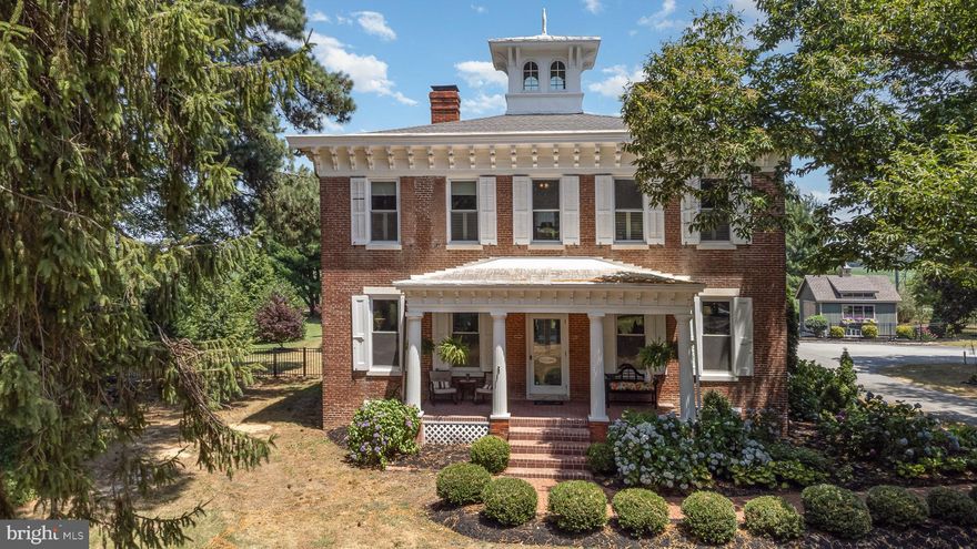 Welcome to the historic "Rose Villa". This beautiful brick Italianate Architecture estate on 2.8 acres is loaded with character, upgrades and charm. Pass through 2 brick pillars on a long tree lined driveway with 
circular access leading to the house. Beautiful porch with pillars at  the front door. Rear and sides 
are gated surrounding a grand brick patio and built in pool. This estate has beautiful outdoor space 
with mature perennial gardens and a large storage shed. Inside you'll find gorgeous hardwood floors, 
10 foot ceilings, wide hallways, arched doorways, thick moldings, chandeliers, fireplaces and the list 
goes on. The main level features a large living room with fireplace, formal dining room, powder room, laundry room, family room with woodstove and a large modern kitchen with broiler and convection 
oven.  It also has has an office or den and and an amazing large Sun room with vaulted ceilings and 
slate floor. Up the grand curved staircase, you find a wide landing and hallway leading to 3 large 
bedrooms that share a beautiful full double vanity bath with shower and soaking tub in the front 
section. There is also an attic staircase that leads to a lighted cupola with amazing views. This also 
gives the home it's distinctive look. A 4th private bedroom and 2nd full private updated bath with 
marble shower in the rear section has a private staircase. A full unfinished basement has modern  
zoned HVAC , Water treatment, and Updated electric panels. Close to Rt. 301 makes for easy 
commuting to Annapolis, Wilmington, Newark, Philadelphia. Home shows absolutely beautifully. 
Own a piece of history and make the Rose Villa yours!