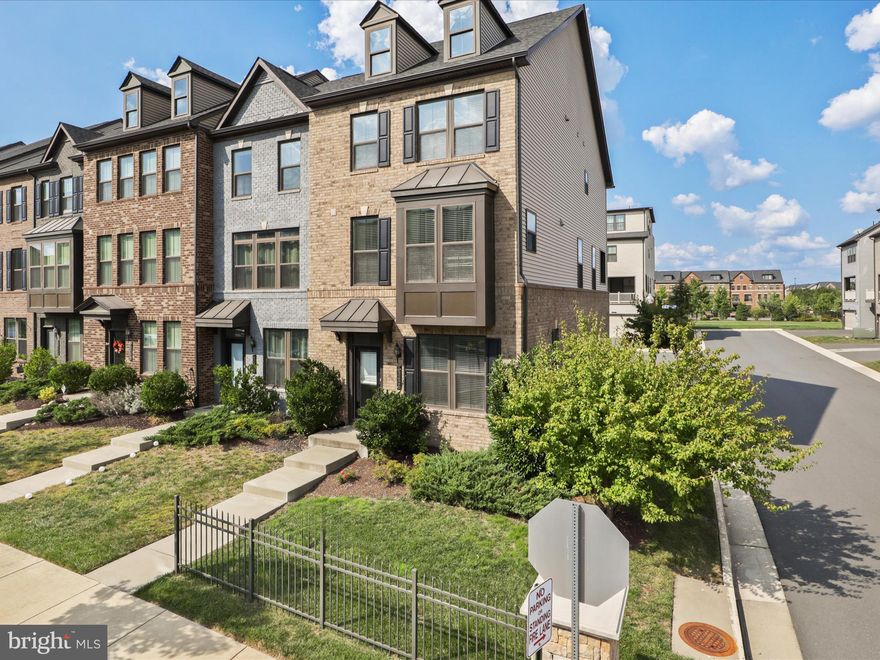 **FOR RENT** Location+Location+Location** Welcome home to Beautiful 'First-Time Renting' END-Unit 3-level townhome in Westmoore Community located in the heart of Ashburn and .5 miles to Silver Line Metro!!! This bright & sunny east facing end-unit townhome is located across from the clubhouse with ample parking spaces. Convenient to shopping at Ashburn Station and Brambleton Town Center. Almost 2500 sf of finished living space, including a second-level covered balcony with a built-in gas fireplace overlooking the 'Highly Sought After' neighborhood of Westmoore at Moorefield. This home has ( 3) bedrooms ( 3.5 ) bathrooms, a large 2-car garage, and driveway parking! Entry level first rec room/office and full bathroom make for easy access. Hardwood stairs lead to the main level, an open concept with beautiful Gleaming hardwood throughout. Gourmet kitchen with white cabinets, beautiful quartz counters, a large island, glass backsplash, stainless steel appliances, a double oven, and a cooktop. Large sliding glass doors lead to the covered patio with the dining room on one side and a family room on the other. Hardwood stairs lead up to the bedroom level with 3 good-sized bedrooms and a laundry room. The bedroom level has a stunning primary suite with tray ceiling, two walk in closets, attached luxury bath with raised height vanities and convenient laundry area in the upstairs hall. 2 more generous secondary bedrooms and upgraded full bath complete this level** Westmoore offers 'Resort-style' amenities, including; a community pool, clubhouse, exercise room, and 2 parks, including Evermore Park with its dog parks (2 parks for small and large dogs), a lake with fountains, amphitheater, large open grass space, 2 tot lots/playgrounds, and miles of walking/jogging trails throughout the community, Walk to soon to be opened Silver line metro, close proximity to Loudoun County parkways, Dulles Greenway and Not too far from fine dining and entertainment.** enjoy outstanding Ashburn amenities w/movie theater, restaurants, shopping , fitness center & state-of the art library nearby** premiere Loudoun county schooling district**Take advantage of all the amenities: Bernie hanson park, pools, sport & tennis courts/fields, adult & youth programs, brambleton town center is minutes away, dining, movies, coffee, groceries, doctors, health clubs. Enjoy 18 miles of paved trails, pools annual events, art & farmers markets**minutes from Loudoun county Pkwy, 606-w, va-267. A Must see!!!!