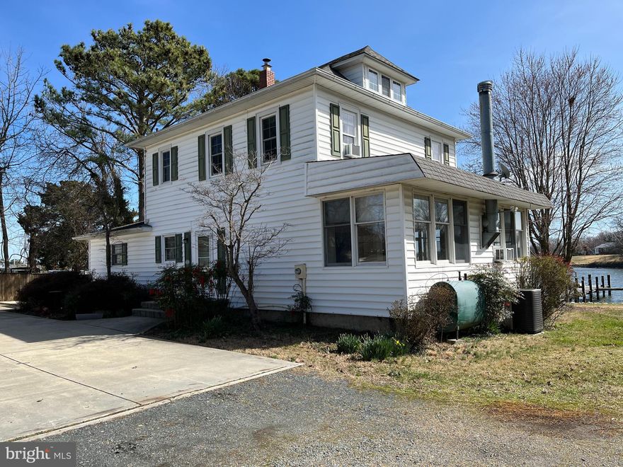 Situated next to the renowned Calvert Marine Museum, home offers scenic views and waterfront living. This waterfront home, a charming 3-bedroom, 1.5-bathroom house located in the picturesque town of Solomons, MD. This waterfront property boasts stunning views and direct access to the water, complete with a private dock and included boat slip. The house features stainless steel appliances, wood floors, and a cozy screened porch perfect for enjoying the serene surroundings. Don't miss out on this rare opportunity to experience waterfront living at its finest.