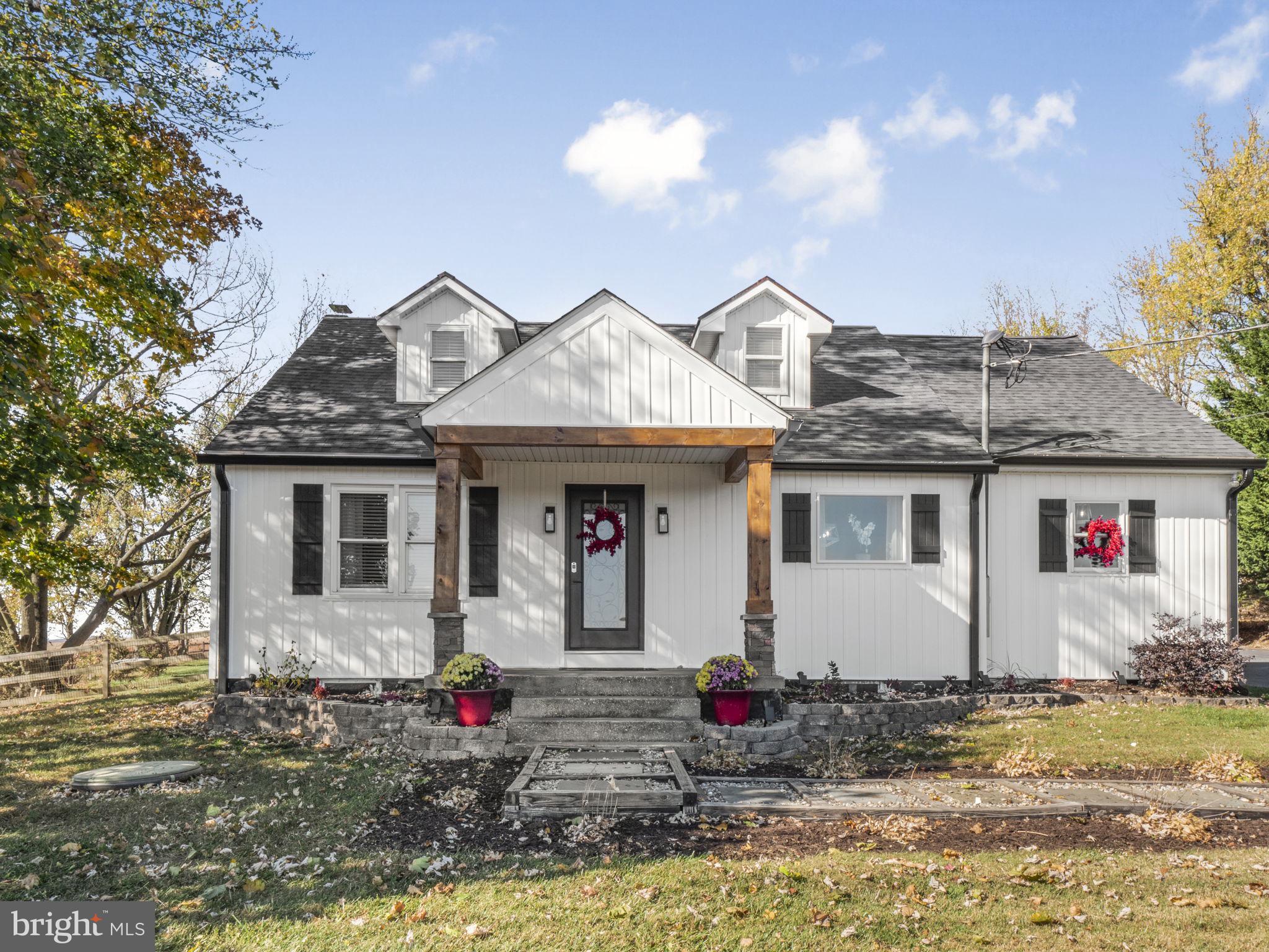 DEADLINE FOR OFFERS IS MONDAY AT 5PM, thank you! Welcome to “Sunset Ridge” nestled in the rolling foothills of Maryland's Catoctin Mountains and surrounded by the countryside of picturesque Mt. Airy, MD. Mt. Airy is a historic small town with a vibrant art community maintaining that small town feel with easy access to areas along the Baltimore - Washington corridor. So many fun things to do and sights to see! Be sure to check out its quaint downtown shopping district, restored Victorian homes and rolling hills which attract hikers from miles away. Beer and wine lovers will appreciate the close proximity of many wineries and craft breweries. Outdoor enthusiasts will find enjoyment in the nearby parks. The charming, stylish and updated Cape Cod has been dubbed, “Sunset Ridge'' after the amazing views of the sunsets witnessed from the level fenced-in yard which is .73 acres and has views of farmland. The landscape features an archway, wooden walkway, and in-ground koi pond surrounded by large multi-color river rocks. Sit back and relax in the covered hot tub on a crisp fall evening. The expansive patio is perfect for hosting a cook-out or for a quiet autumnal night roasting marshmallows by the fire pit. The home features an open and inviting floor plan and has numerous updates and features. First floor features a mud room/laundry room with stainless steel washer and dryer, sink and built-in cabinet and ceramic tiled flooring and door to back patio. The gourmet kitchen is perfect for entertaining and is flooded with natural sunlight from the numerous windows including a large picture window in the dining room overlooking the local farmland. It features white cabinetry, granite countertops, stainless steel appliances, breakfast bar, pantry, ceramic tiled flooring and large table space area. The kitchen adjoins the spacious family room with white stacked stone tile wall and built-in fireplace and framed-out TV. It features crown moldings and trim throughout with low maintenance laminate wood flooring. The main floor also features two bedrooms and one full bathroom. The upstairs is the spacious primary suite that goes on and on! Featuring a walk-in closet, and bonus room for wardrobe styling, make-up, home office or nursery. The full bath is light-filled with an updated vanity, mirror and lighting with a restored porcelain tub. Looking for a reprieve? Head to the basement featuring three rooms complete with a rec room, a built-in bar, game room, a cinema room for movies and popcorn & extra storage rooms. Oversized two car, (maybe 4 cars tandem) detached garage with electric, cooling, water and automatic doors with ample driveway parking. Come for a visit and stay a lifetime.  Full list of Updates & Improvements in the disclosure tab.