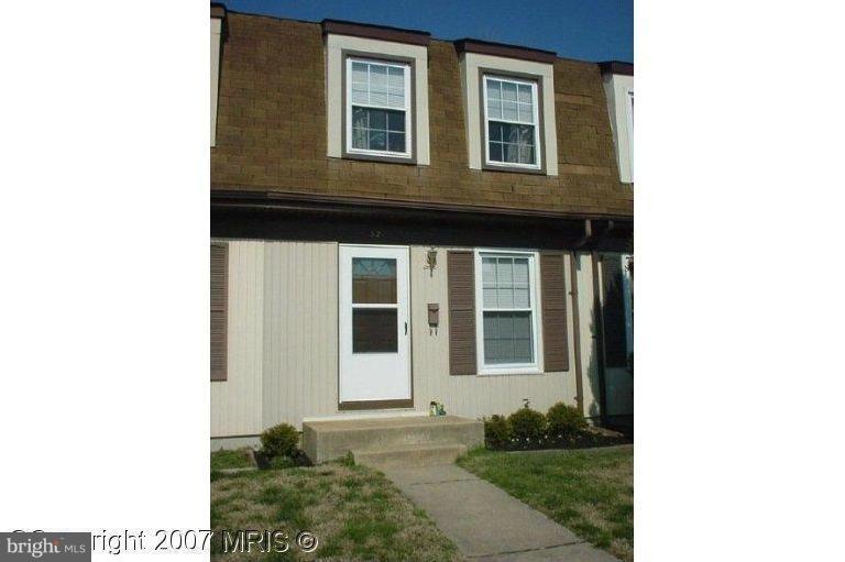 Cozy 3 bedroom, 1 full bathroom interior townhouse condo in the Belmont Community. Enjoy a partially finished basement, some pergo flooring, newer windows, an updated kitchen, and fenced in backyard. Add in some TLC and make this house your home. Property was built prior to 1978 & lead based paint potentially exists.