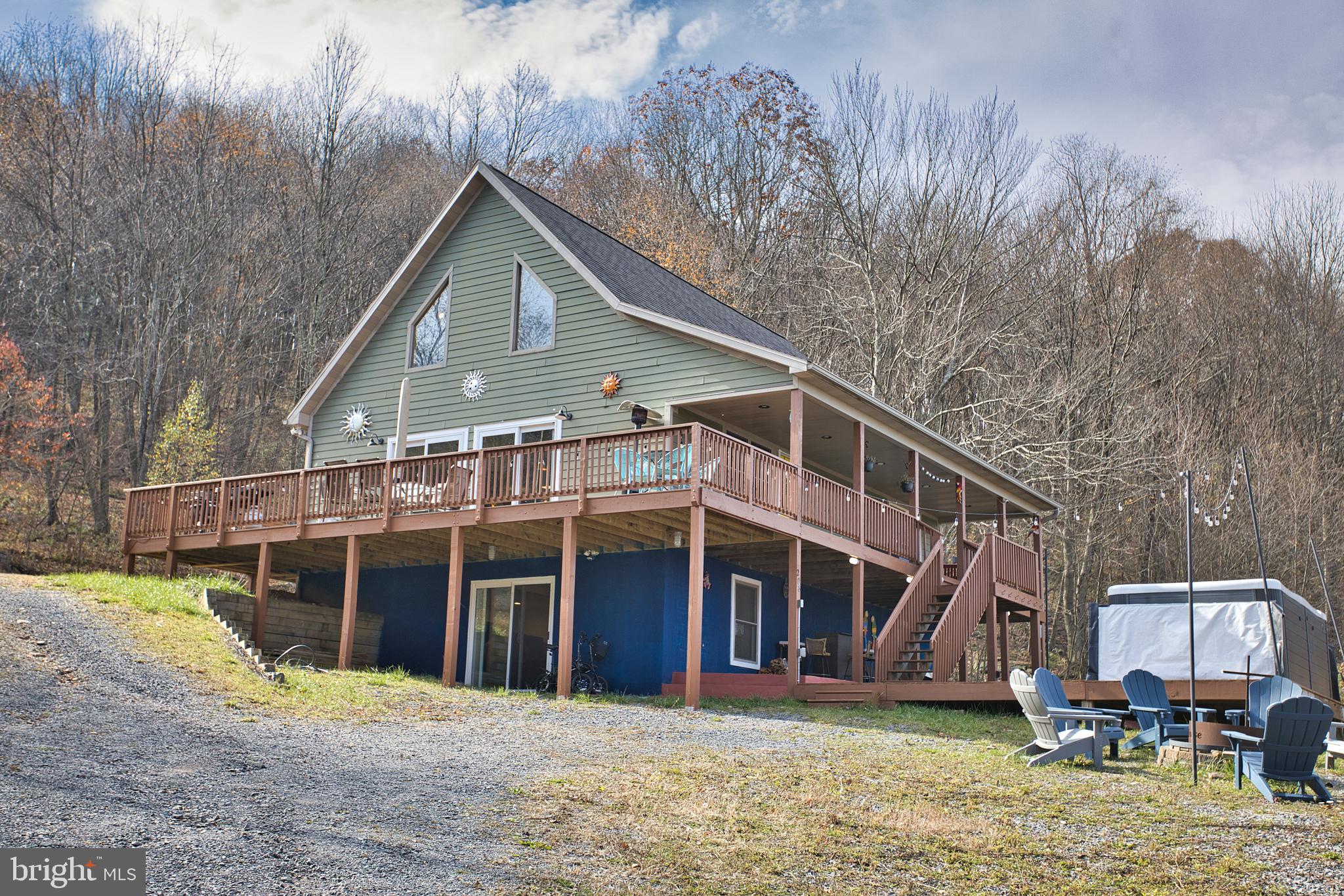 Get a Mountain Paradise: Spectacular Cabin with Breathtaking Views. This stunning cabin offers everything you need for the perfect vacation or weekend relaxation. With panoramic views of the surrounding peaks, you'll feel immersed in nature while enjoying the comfort of a spacious, beautifully designed home. Located in a serene and quiet area, this cabin offers the ideal environment for rest and rejuvenation, away from the hustle and bustle of city life. Just minutes from the ski resort, supermarket, and lake, offering a combination of proximity and comfort.
Large, open-air decks perfect for relaxation or entertaining, offering a seamless indoor-outdoor living experience. A state-of-the-art Swim Spa for ultimate relaxation, no matter the season. Whether you're cooling off in the summer or unwinding after a day on the slopes, this feature is a true luxury.
Whether you're looking for an active vacation home or a property to rent, this cabin is your option to year-round enjoyment. From ski trips in winter to lakeside strolls in the summer, you’ll have everything you need right at your doorstep.
3 levels of finished space. A spacious loft in the upper level, and a great recreation room in the lower level. One gas fireplace that provide most of your heating needs. Spacious Kitchen with granite counters and 2 new refrigerators. On top of all that you will find public water and sewer and High Speed Internet.