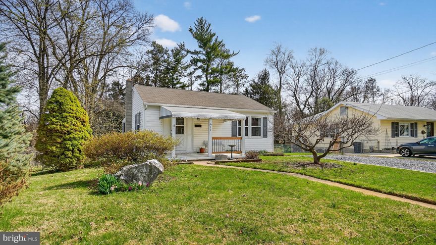 Welcome to 611 Beverly Road, a charming ranch-style home located in the Park Hill Manor community of Reisterstown. This well-maintained property offers a functional layout, inviting living spaces, and great natural light throughout. The covered front entry welcomes you into the living room featuring a striking accent wall and luxury vinyl plank flooring, creating a warm and comfortable setting. A separate dining area provides flexibility for both everyday meals and entertaining. The recently updated kitchen showcases modern finishes including stainless steel appliances, quartz countertops, a subway tile backsplash, plenty of cabinet space, and direct access to a screened porch, perfect for relaxing or enjoying outdoor dining.  The main level includes a spacious primary bedroom with room for a sitting area or home office. The lower level features an additional bedroom along with flexible space that can be used for a home office, guest area, hobbies, or storage. Step outside to a rear patio overlooking a large backyard, ideal for entertaining, gardening, or simply enjoying the outdoors.  Conveniently located near major commuter routes including 795 and 140, as well as shopping, dining, and outdoor recreation, this home offers both comfort and convenience. A wonderful opportunity to own in an established Reisterstown neighborhood.