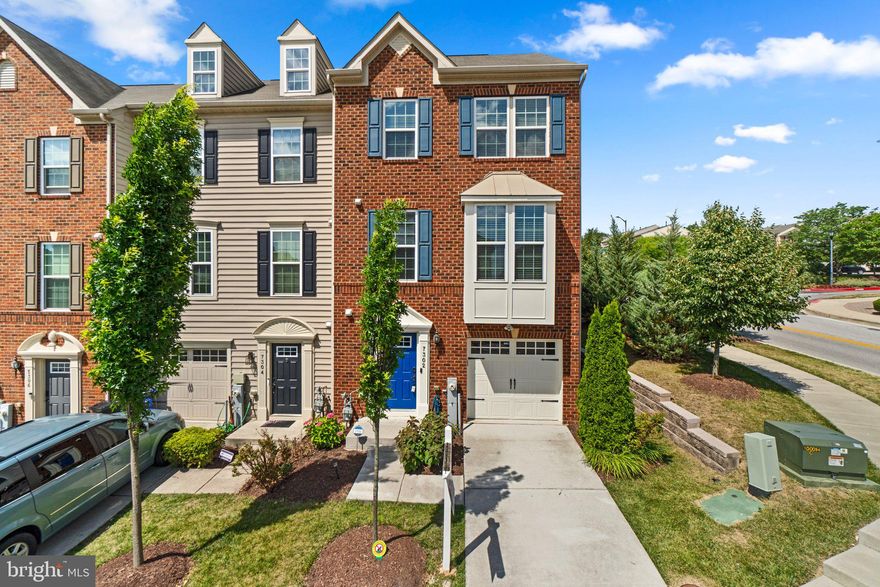Welcome to this stunning end-unit 4 Bedroom, 3 Full and 1 Half Bathroom, 1 Car Garage Town Home in convenient Howard Square Community. 3 Finished Levels with Builder upgrades. 9+ft ceilings. This townhome stands out with its stunning brick facade, seamlessly blending sophisticated aesthetics with functionality and a convenient lifestyle. Step into the Ground Floor (main level) adorned with hardwood floor, a bedroom, a Full bath, additional space for a powder room currently used as a closet, access to a generous 1-car garage, and French double-door access to step out and enjoy the beauty of the back yard. Walk up the wooden stairs to the second floor, the heart of the home unfolds into a sun-drenched living area, boasting hardwood floors that extend into a gourmet kitchen. This culinary haven is equipped with granite countertops, ample cabinet space, a central island for bar stool gathering, and sleek stainless-steel appliances, making it a dream for cooking enthusiasts. Adjacent to the kitchen is the dining area, which features a bar/buffet closet with lighting, and offers French double-door access to a large, maintenance-free deck. This deck not only provides the perfect setting for entertaining but also offers a serene view into the woods providing natural privacy, a rarity in townhome living that promises endless outdoor enjoyment and gatherings. The top floor is dedicated to a luxurious master bedroom suite with a soaking tub, walk-in shower, double vanity sink, and a spacious walk-in closet, epitomizing comfort and style. The two additional bedrooms have plenty of natural light and ample storage space, a full hallway bathroom, and a laundry area with a washer and dryer. This house is move-in ready with recessed lighting throughout the home. Convenient access to Fort Meade, Columbia, Baltimore, Annapolis & BWI, DC with nearby routes 1, I-95, 32, and 175 and shopping and dining.