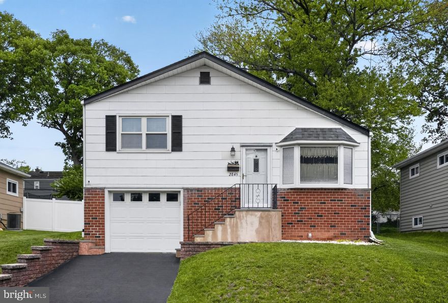 Welcome to 2845 Turner Avenue, a split-level home on a fantastic street in Roslyn! This classic property offers fantastic curb appeal and a timeless brick exterior. Step inside to the bright and inviting living room, which flows seamlessly into the dining area — perfect for everyday living and entertaining. The kitchen features a stainless-steel refrigerator, ceiling fan, gas cooking and sliding doors leading to the rear deck overlooking the backyard.  Upstairs, the spacious primary bedroom provides the perfect retreat to relax at the end of the day. Two additional bedrooms and a hall bath with a shower/tub combo complete the upper level along with attic access.  The lower level features a cozy family room with access to the backyard, along with a convenient half bath. An unfinished basement houses the laundry area, mechanicals, and a French drain with sump pump. Additional highlights include a newer roof (approximately 5 years old), new heater (2025), replacement windows, and a 1+-car attached garage.  Enjoy all that Abington has to offer, including convenient access to shopping, dining, public transportation, and major highways. Schedule your showing today and move in just in time to enjoy summer in your new home!