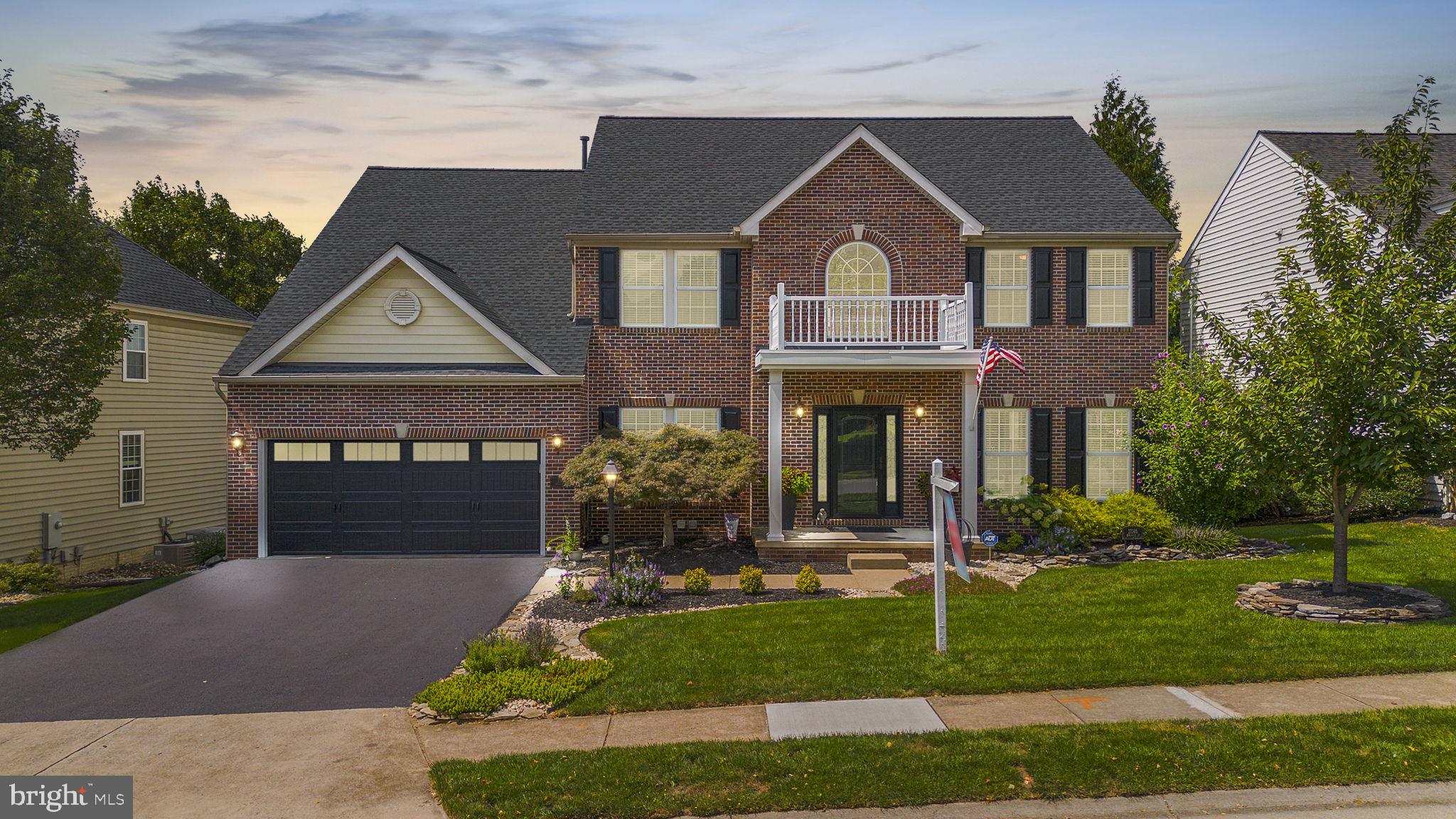 Welcome to 11086 Sanadrew Drive, a stunning gem in the highly desirable Westwinds of Lake Linganore! This home truly feels like a private retreat with its impressive updates and meticulous care. From the moment you arrive, you'll be captivated by the exceptional curb appeal, manicured grounds, and inviting hardscaping.
Step inside to a grand two-story foyer bathed in natural light, and you'll immediately notice the elegant hand-scraped hickory hardwood floors that flow throughout the main level. To the right, a private office (or potential first-floor bedroom) awaits, while to the left, a spacious living room features custom crown moldings. Columns guide you into the dining room, which boasts chair rail, crown molding, and custom wall moldings. The kitchen is a culinary dream, with 42" maple cabinets, granite countertops, recessed lighting, a custom backsplash, and ceramic tile floors. It also features a separate desk area, stainless steel appliances, a pantry with a barndoor, and a massive custom island with a microwave drawer, cooktop, extra seating, and abundant storage. The family room exudes warmth and coziness with its custom gas fireplace, hearth, and mantel, complemented by upgraded carpeting. Adjacent to the family room is the sunroom, where expansive windows and a custom arch frame a breathtaking view. French doors lead to a spacious deck with a retractable awning, perfect for enjoying sunsets and relaxation. The thoughtfully designed laundry/mudroom includes space for folding, a laundry tub, and garage access. As you ascend upstairs take note of the updated iron stair balusters and custom carpet. The custom hickory floors extend throughout the upper hallway and into the magnificent Primary Suite. This luxurious retreat features a sitting area, vaulted ceilings, crown molding, and an extraordinary closet with custom cabinetry. The spa-like primary bath includes heated floors, a large soaking tub, dual vanities, a walk-in linen/medicine closet, and a separate shower with elegant tile work. Three additional spacious bedrooms and an updated full bath complete the upper level.
The basement is a versatile space with LVP flooring and neutral finishes and includes a large rec room, exercise room, fifth bedroom with a walk-in closet, storage areas, and access to an impressive back patio.
The outdoor space is a true masterpiece, featuring stone retaining walls, high-end pavers, solar lights, and a custom firepit. Every detail of this home has been thoughtfully upgraded, including new light fixtures, door handles, custom window treatments, and several barn doors have been added throughout. The interior has been freshly painted, and recent updates include 2019 and 2014 HVAC systems, a 2023 roof, a 2020 water heater, and new attic insulation.
The Lake Linganore community offers a wealth of amenities, including four swimming pools, pickleball and tennis courts, basketball courts, a private lake with beaches, and scenic hiking trails. Plus, the nearby old community golf course, which will never be developed, provides additional green space and recreational opportunities and is within walking distance of the home!
Don't miss out on this beautifully designed home with an assumable VA loan—it's a private sanctuary with everything you could desire!