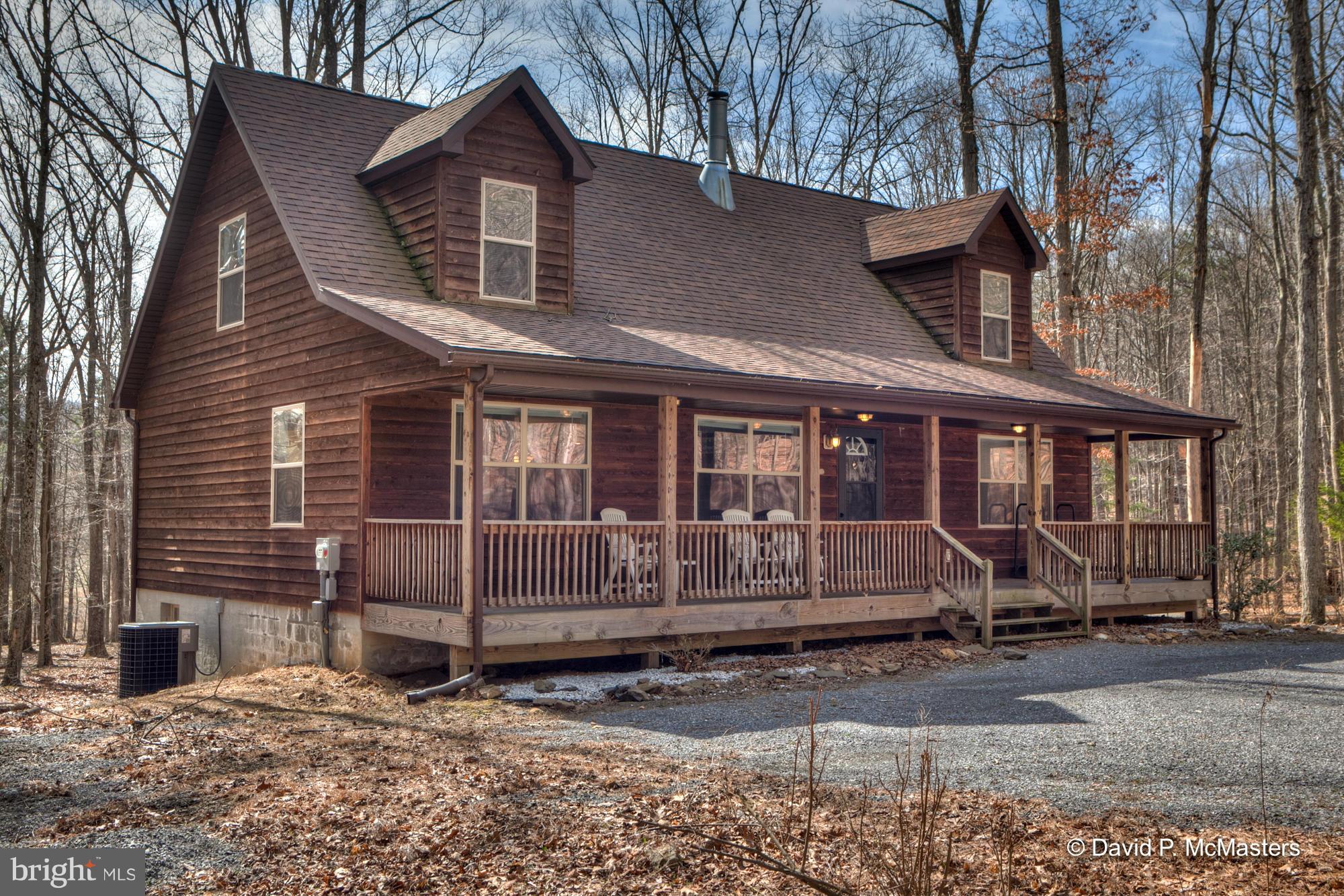 May be the best deal around.REALLY nice 5 BR 5BA Cape Cod on .58 acre. Woodburning fireplace, open floorplan,- approx 3400 sq ft. .Coolfont offers some nice amenities: inground pool, hiking trails and what people really appreciate -peace and quiet.Captivating area and a big front porch and screened in back deck to enjoy it . Berkeley Springs just a short drive.Beautiful Home-Brilliant Lifestyle