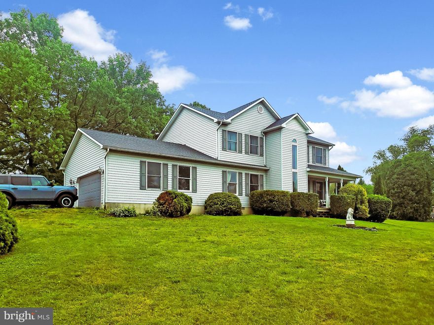 This Rare Rural Gem awaits you!   A long, private driveway, leads you to this 3 bedroom, 2 1/2 bath traditional 2 story home, surrounded by farmland.  This one acre lot, gives you the elbow room you need for country living.   The first floor boasts tons of space, including a formal living room, a family room, eat in kitchen with island, dining area, private office/den and a main floor mud room/laundry room.  The second floor features a large master suite with a bathroom large enough to dance in, with separate tub with a sky light above, and separate shower.  The finished basement features two large rooms that could be a playroom, other office space, man cave, media room or whatever you desire.  Other features include a brand new roof and central air in 2024.  All appliances stay.  Call for an appointment today, don't delay! And by the way, NO HOA!  Zoned Rural Residential.