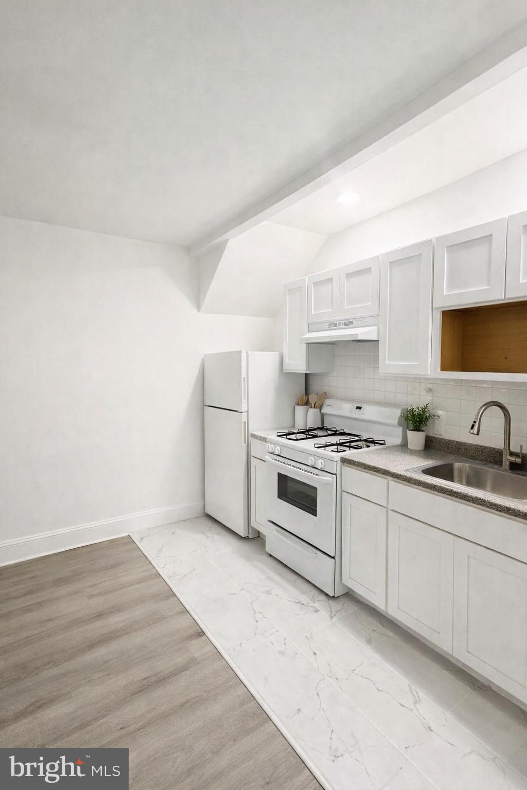 Photo of 6647 Blakemore Street #A, PHILADELPHIA, PA 19119 (MLS # PAPH2565394)