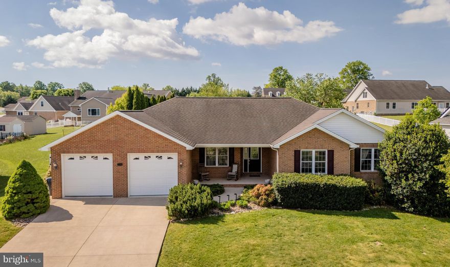 Incredibly spacious, all-brick home with everything you need on one level PLUS a full basement! Main level includes formal dining room with chair rail and hardwood floor, 17x20 living room with gas fireplace, eat-in kitchen with stainless appliances, 8x9 laundry room with utility sink, half bath, and three bedrooms and two full bathrooms, including owner's suite with 15x17 bedroom, walk-in closet, jetted tub. Basement level has a large storage area, and an additional 1,445 sq. ft. of finished space, with 4th bedroom, 3rd full bath, and an enormous rec room! Two-bay garage includes additional 10x21 area for workshop or storage, as well as a ramp for wheelchair accessibility. Outdoor areas include 6x18 covered front porch, 16x26 rear patio, fully fenced back yard, 10x16 storage shed, and something you won't see very often in a residential neighborhood -- a 14x20 pavilion with metal roof, electric outlets, concrete pad, and two ceiling fans! HVAC system replaced in 2023.