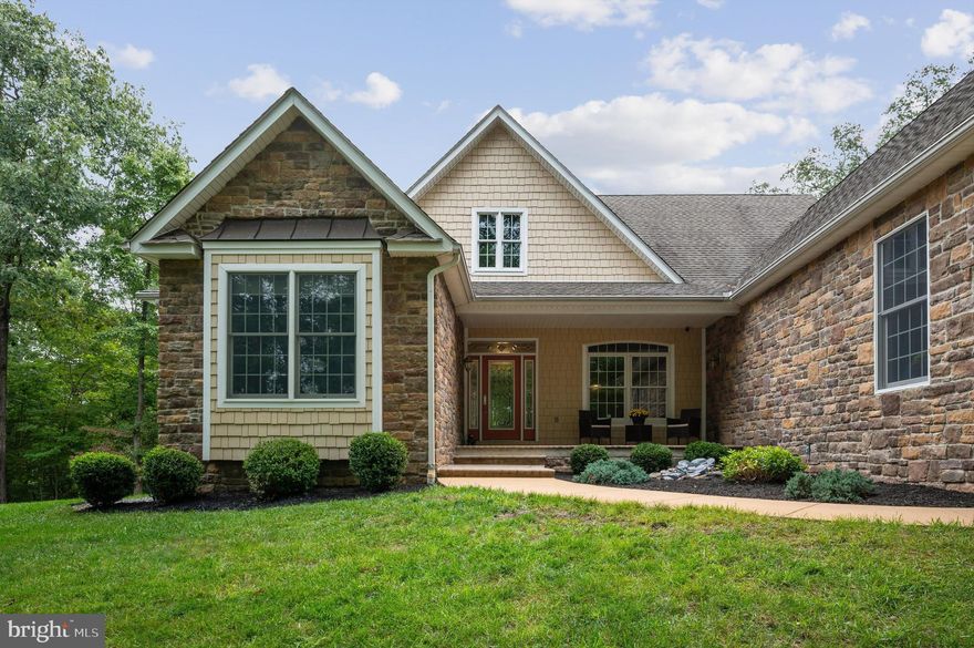 Nestled on over 11 acres, this exceptional property combines open yard space and serene wooded privacy, all within minutes of I-81 located in a highly desirable neighborhood. With over 4,700 sq ft of thoughtfully custom designed space, this home offers the finest in one-level living, featuring 2x6 construction, a spacious 2-car garage, and a fully finished walk-out basement complete with natural light, a workshop, and abundant storage. The open floor plan boasts cathedral and 9-ft ceilings, oversized 6-ft windows, and rich hardwood and tile flooring throughout. The gourmet kitchen is a chef's dream, showcasing cherry cabinetry, granite countertops, large island and plentiful storage. Retreat to the luxurious primary suite with its spa-like bath for ultimate relaxation and the walk in closet with custom built-ins is a plus. The great room is anchored by a stunning stone fireplace, while the sunroom is bathed in natural light. The finished basement includes a large family room and a full bath, perfect for entertaining. Outdoor living is equally impressive, with a deck, patio, covered front porch, and a shed for extra storage. Don’t miss this rare opportunity to own a private retreat in a prime location!