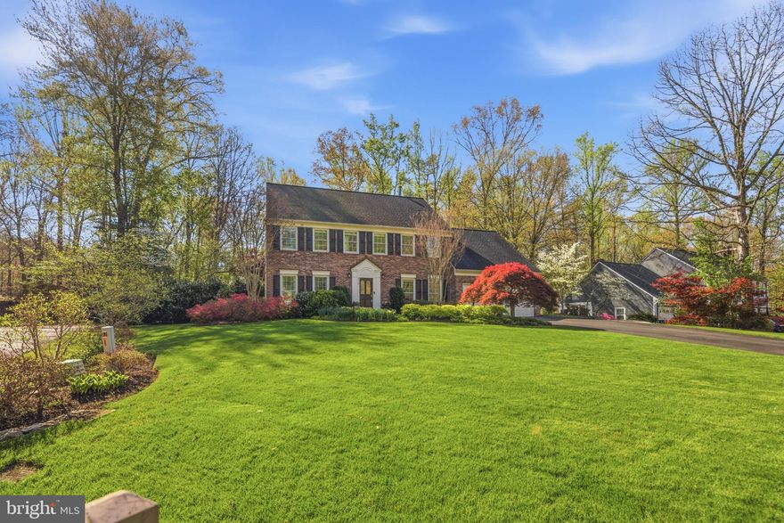 Welcome to this stately & meticulously maintained South Run residence, where timeless elegance meets exceptional everyday living. Perfectly situated on a private, tree-lined .6 of an acre lot, this home offers a rare blend of refined interiors & resort-style outdoor living designed for both comfort & entertaining.
 From the moment you arrive, the updated flagstone walkway (2024) sets the tone, leading to a beautiful home with a specially curated outdoor retreat featuring a slate patio, additional brick patio, outdoor speakers, gas line for grilling, two storage sheds, & a fully fenced backyard (2025). The backyard is a true sanctuary—completely surrounded by trees for total privacy—highlighted by a stunning 9-ft deep heated saltwater pool with a brand new electric cover (2026), hot tub, sprinkler system, & even a hot water hose ready for an outdoor shower. A natural gas grill conveys, making this space ideal for effortless entertaining.  Inside, the home showcases rich hardwood flooring throughout the entire main level, enhanced by elegant moldings, built-ins, & thoughtful upgrades throughout. The extra large family room impresses with vaulted ceilings, skylights, updated lighting, a gas fireplace with quartzite surround, custom built-in bookshelves & cabinetry & expansive picture windows that frame serene backyard views!  Adjacent, the breathtaking four-season room serves as a true showpiece with vaulted shiplap ceilings, walls of windows, stone accents, a gas fireplace, slate flooring, & a dedicated mini split system—creating a year-round retreat.  The chef’s kitchen is both sophisticated & functional, featuring stainless steel appliances including double ovens, a countertop microwave, two sinks, a five-burner Wolf cooktop, Sub-Zero refrigerator, expansive island, quartzite countertops, updated cabinetry, modern lighting, & a walk-in pantry. The dining room is filled with natural light from picture windows & accented by chair railing, while the living room offers custom built-ins & crown molding. A private main-level office with built-in shelving provides the perfect work-from-home space. There is a  main-level laundry room with cabinetry.  Upstairs, you’ll find four spacious bedrooms & two beautiful professionally updated bathrooms. The luxurious primary suite features hardwood flooring, an electric fireplace, & a special large walk-in closet with custom built-ins. The spa-inspired modern primary bath is truly exceptional, offering heated porcelain tile floors, a jetted Jacuzzi soaking tub, frameless glass steam shower, skylight, & a sleek double vanity. The hall bath has also been tastefully updated.  The walk-up lower level expands the home’s versatility with a large recreation room featuring new carpeting, another built-in electric fireplace, wet bar with mini fridge, & French doors leading to the brick walk-up. Also enjoy the renovated full bath here. Additional spaces include a lovely den (flex guest room?), cedar closet and an extensive storage room with built-in shelving &  workbench.  Additional highlights include 2 ventless gas fireplaces & 2 electric fireplaces, ceiling fans throughout, a leak defense system designed to automatically shut off water in the event of a leak,  Terminix service contract that conveys & epoxy-coated garage floor with finished walls (2020). The home also features a half bath on the main level & a total of three full baths.  Updates include; KITCHEN, FAMILY ROOM & 4 SEASONS ROOM ADDITION (2024) / HVAC x 2 (2023, 2022) / Roof (2019) / MASTER BATH (2019) / PELLA WINDOWS (2009) . Every detail of this exceptional home has been thoughtfully curated to offer comfort, style, & peace of mind—all in one of South Run’s most sought-after settings, just moments from trails, community amenities & easy access to major commuter routes into DC & the Pentagon. This  home also feeds into the coveted Blue Ribbon Sangster Elementary & Lake Braddock Secondary.