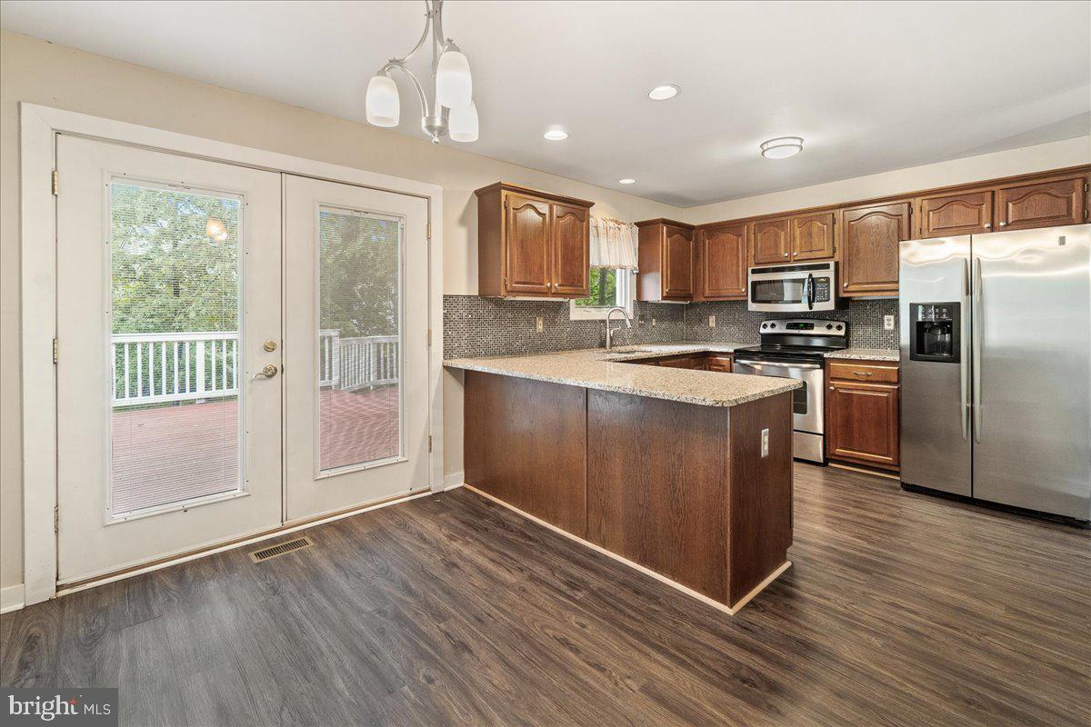 WOODSPRING AT NEW MARKET - Residential