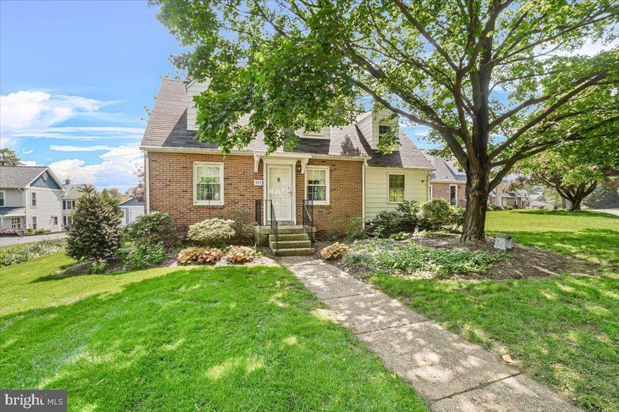 Charming brick Cape Cod in the heart of downtown Mt. Airy! This delightful home features a nice kitchen, a formal dining room with built-in corner cabinets, and a spacious living room with a cozy fireplace. A main-level office/bedroom includes a full bath and convenient laundry area. Upstairs, you'll find one bathroom, two bedrooms with dormer storage—one with a private sitting room and built-ins.  Sitting room could be possible bedroom.  The lower level includes a den and ample storage. Enjoy the beautifully landscaped yard and patio.  Easy sidewalk access to downtown Mt. Airy’s dining, shopping, and more!