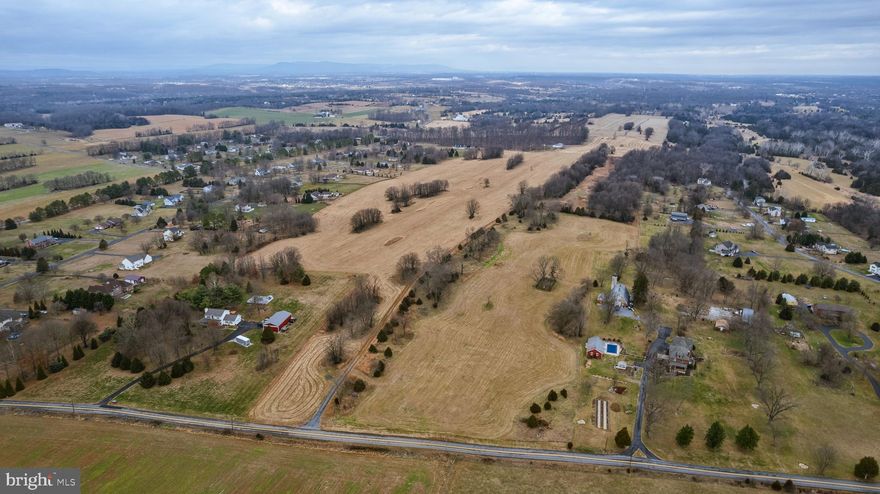 Nestled along scenic Swan Pond Road just minutes from Shepherdstown and Martinsburg, this expansive 56.37-acre parcel of mostly pasture land offers a rare combination of privacy and natural beauty perfect for farming, family retreat, or possible minor subdivision.  Conveniently located just minutes from I-81 and the amenities of Martinsburg, yet surrounded by peaceful rural landscape, this tract delivers unparalleled country charm with easy access to local schools, shopping, restaurants, and commuter routes.  Lots of possibilities exist with this land parcel!