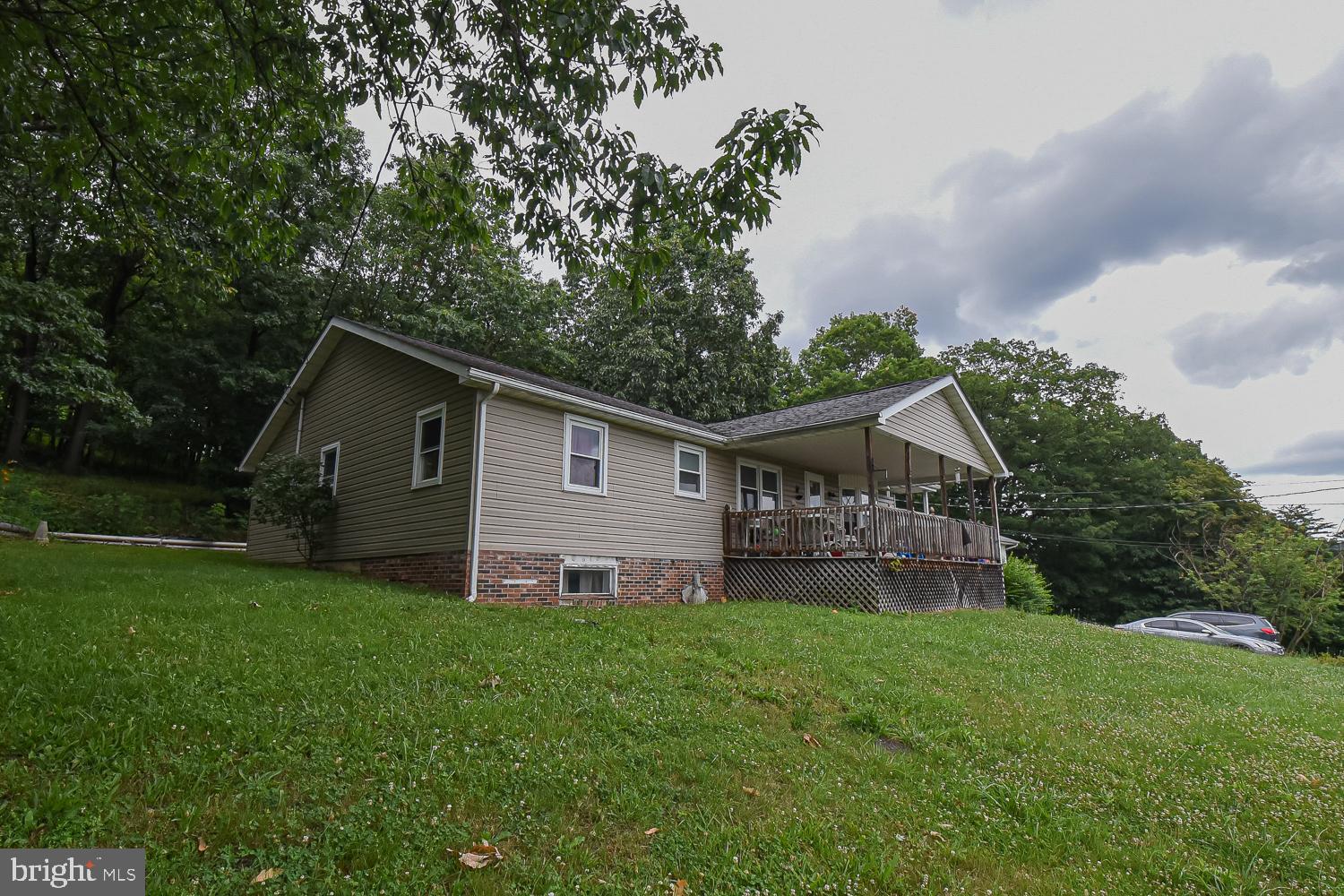 You can't beat this deal! Fantastic price and opportunity for a 3 bed 2.5 bath raised rancher located just outside of Keyser! HUGE finished basement for even more space for all your needs. Rear yard backs to trees for additional seclusion. Check this one out!