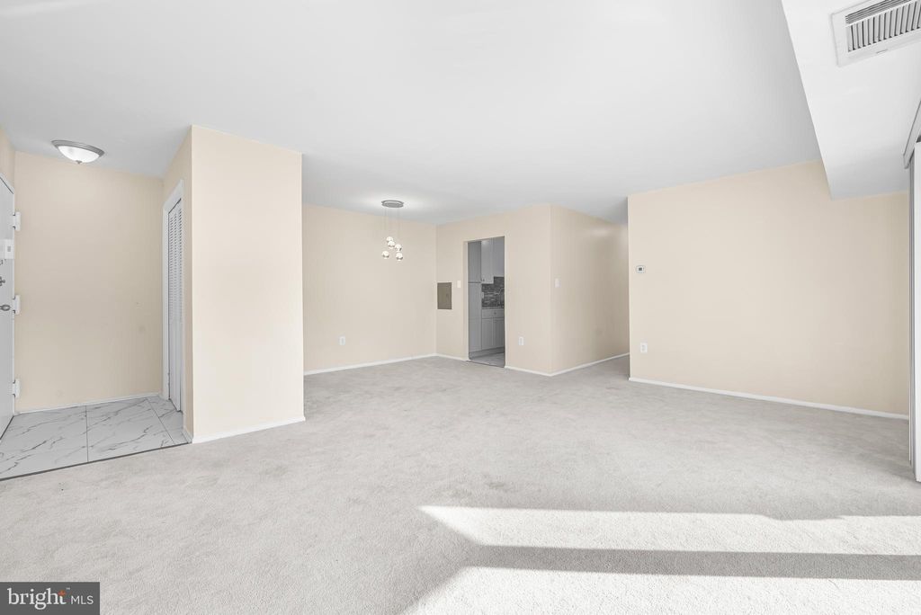 Photo of 5204 Newton Street #304, BLADENSBURG, MD 20710 (MLS # MDPG2180390)
