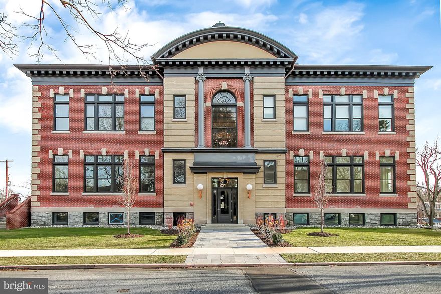 Penthouse-Style Condo with Private Deck & Designer Finishes  -  

Perched on the top floor of the beloved old Wyomissing Art Institute building, this modern condo offers quiet, elevated living on a quiet street just steps from the park system and minutes from the hospital, schools, and Penn Avenue amenities.  -  

Step inside, where a welcoming foyer with oversized doorways exposes all the designer finishes and traditional touches that make this building truly one-of-a-kind.  -  

The great room is wrapped in high-end vinyl flooring for a clean, modern look that’s easy to care for, and brightened by several tall windows, soaring ceilings with recessed lighting, ceiling fans, and wood details, and a statement-making brick accent wall.  -  

The kitchen is both a chef and entertainer’s dream with newer stainless-steel appliances, including gas range and hood, massive eat-in island with vegetable sink, tile backsplash, soft gray cabinetry, and quartz countertops.  -  

The open living and dining space flows naturally toward the private deck, extending your living area outdoors and creating an easy spot to enjoy morning coffee with views of the Boro playground and park below.  -  

Just off the kitchen, a former pantry has been converted into a dedicated laundry area, right where you need it for everyday convenience, while an adjacent bonus space offers the perfect nook for a sun-soaked home office.  -  

The Master bedroom is set up as a true retreat, with multiple tall windows, a high ceiling with recessed lighting and ceiling fan, light carpeting, and a large walk-in closet outfitted with built-in organizers.  -  

The private bath features a His and Hers vanity with a quartz top, step-in tile shower with glass door, and tile flooring to deliver a clean, updated feel with plenty of storage and spa-like appeal.  -  

A secondary bedroom enjoys the same soaring ceilings, tall window, and carpeting for comfort. Down the hall, past the exposed brick accent wall that adds warmth and character to the sleeping quarters, there’s a hall bathroom with tile flooring, large vanity, and tile tub/shower.  -  

Reserved covered parking, a shared outdoor terrace, fitness room, and private storage all add to the convenience and luxury to make this high-end, low-maintenance condo a rare find in the heart of Wyomissing.