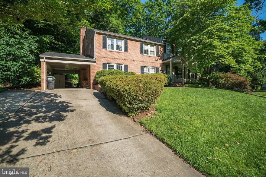 Great 4 bedroom, 3.5 bathroom split level colonial. Updated kitchen w/ newer appliances & granite counters. Large family room w/ brick fireplace & new carpeting. Renovated half bath & two upper hall baths. Large master suite w/hardwood flrs under carpet w/ walk-in closet and en suite bathroom. Finished basement & large fenced backyard w/ brick patio. Carport & separate mud/laundry room.