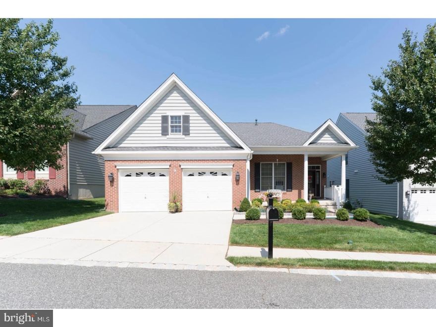 Welcome to this sought after 55+ community. Ideally located, this flat, open lot is right across from lovely walking trails and close enough to walk to both pools (indoor and outdoor), tennis or bocce courts, fitness center and elegant club house. Enjoy airy 10 ft plus ceilings and open plan of this meticulously maintained and move in ready San Tropez model. The foyer flows gracefully into the dining room, living room and large family room, ending at the sun filled breakfast room next to the gourmet kitchen outfitted with new stainless steel appliances, cherry cabinets and granite counters. Large master bedroom suite complete with a walk in closet and master bath holds both a stall shower and soaking tub. Second bedroom and another full bath has been adapted to be handicap accessible. The recently renovated laundry room, linen closet and comfortable Den/Office bring you back to the front. Spread out with the extended deck patio outside or inside with the attached two car garage. New water heater, new washer and dryer and Anderson windows. NEW ROOF AND HARDWOOD FLOORS. Tons of storage space with a full size loft above the 2 car garage. Enjoy maintenance free, one floor living at its best in this social and pet friendly community that is close to farmer's markets, retail and grocery stores, restaurants, golf courses and an international airport.