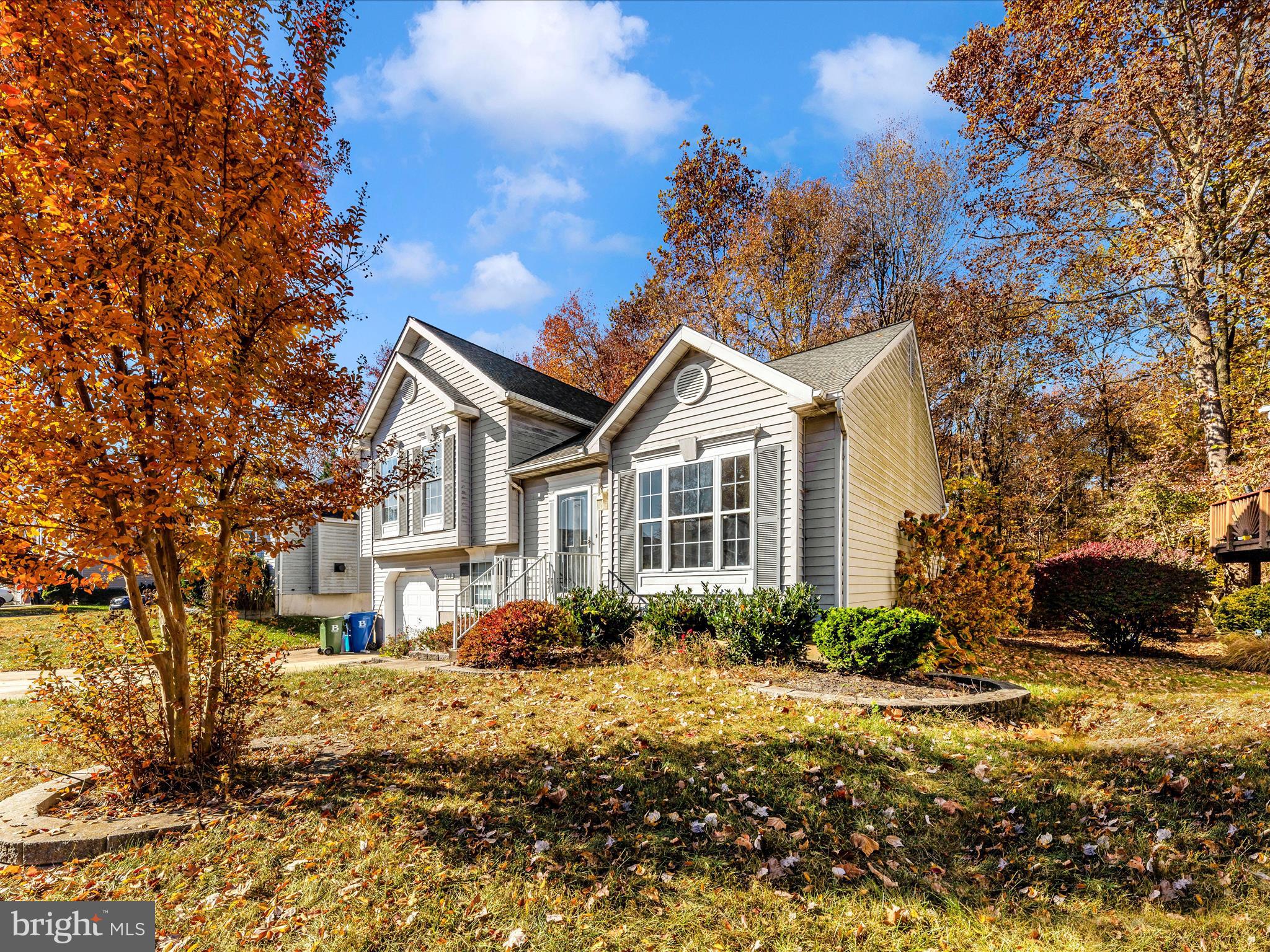Opportunity awaits! This wonderful 3 bedroom 2.5 bathroom split level home is ready for its next owner! As soon as you step inside the front door you will notice the living room is full of natural light, hardwood floors, cathedral ceilings and a conveniently located 1/2 bathroom. The kitchen offers modern lighting, tons of cabinets and the perfect size island for enjoying breakfast in front of a wall of windows. The formal dining room has a slider for easy entertaining on the back deck. Upstairs you will find 3 bedrooms and 2 full bathrooms. The master ensuite is in the middle of renovations and will be left for the new owners to add their personal touches. Laundry room is located downstairs with extra storage space, garage access and a bonus room that walks out to the back yard. This home does have a Newer roof (2021) and HVAC unit (2019)! There is a double parking pad in front of the garage and a gorgeous wooded view outback. Priced accordingly for the needed repairs - this is part of an estate and being sold AS IS. Call your favorite Realtor for a tour!!!