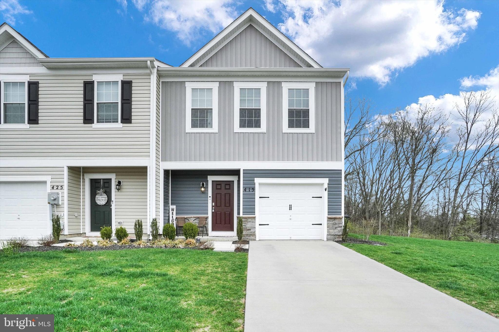 Welcome to 415 Locust Run Dr. This end-unit townhome comes with an extended driveway and a fully finished garage, offering versatility for your hobbies and interests. Step outside to an oversized, upgraded patio with beautifully paved surfaces, perfect for outdoor relaxation and entertaining. Just a short walk away, you'll find a cozy campfire area featuring a firepit, ideal for enjoying warm evenings under the stars. A perfect blend of convenience, comfort, and outdoor living! These units have proven popular. You will love this one the MOST! Schedule your showing today!