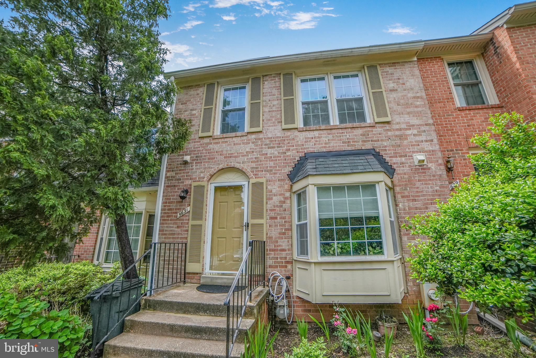 Welcome to 5631 Hogenhill Terrace, a beautifully maintained 3 bedroom, 2 full and 2 half bathroom brick front townhome in one of Rockville’s most desirable communities. Nestled in a quiet neighborhood and backing to a peaceful wooded area, this home offers the perfect balance of comfort, charm, and convenience.
Inside, you'll find three finished levels with hardwood flooring, a cozy fireplace, and tasteful updates throughout. The main level features a spacious living area, a separate dining room ideal for gatherings, and a bright table space kitchen with ample cabinetry.
Upstairs, the large primary suite includes a private en suite bath, while two additional bedrooms share a well appointed full bathroom. The finished walkout basement provides flexible living space great for a home office, gym, or rec room and includes a half bath and generous storage options.
Enjoy the serenity of tree lined views right from your windows. With two reserved parking spots right out front and walkable access to schools, grocery stores, and shopping, you’ll love the everyday ease of this location. Commuters will appreciate quick access to major roads and public transit options.
Don’t miss this incredible opportunity to own a move in ready home in the heart of Rockville. Schedule your showing today!