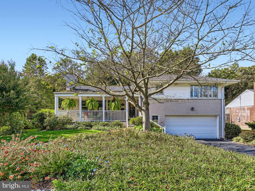 Welcome to 6120 Haddon Hall Road, in the coveted Woodbrook Village neighborhood! This aesthetically pleasing home offers a multitude of features that cater to both practicality and leisure. The front yard and porch both belong on a southern living magazine cover with its mature landscaping and colorful plants in bloom. The inside is just as picturesque with a family room that offers amazing views of the lush landscaping and provides a large space for big gatherings but still incorporates  the coziness desired in a family room. This room is graced with built ins, a gas fireplace and hardwood floors to add to its beauty.  The dining room is easily accessible from both the family room and the kitchen making entertaining a breeze. The kitchen is fully updated with granite countertops and stainless steel appliances for your move in ready needs. Off the kitchen is a staircase leading you to a lower level with a large second family room and the heated two car garage with extra storage! This highly desired second family room also leads you to a covered patio and the beautiful and flat back yard. Another set of stairs leads you to the fully finished basement with laundry, half bath and storage galore and over 600 square feet of space for the room of your dreams plus cedar lined closets and built in shelving for ample and organized storage!
Back on the main level is an extra wide staircase that takes you upstairs with three exceptional sized bedrooms, two full and updated bathrooms, hardwood flooring and plenty of storage in closets. 
The kitchen allows for access to the trex deck and a backyard which is a gardening delight with more incredible landscaping to enjoy. This home has it all, location, space, updates, and gorgeous curb appeal you will not want to miss out on!