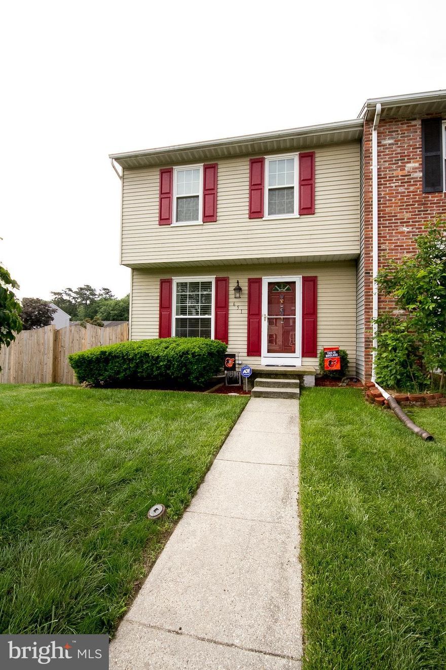 This spacious end-of-group home is move in ready for you!  Beautiful home updated throughout:  granite counters and 42" cherry cabinetry in kitchen, new fence & updated deck, new wood floors in dining room & kitchen, 3, full, updated baths, and more. Finished lower level with large family rm.  & walkout to fenced side and back yards.