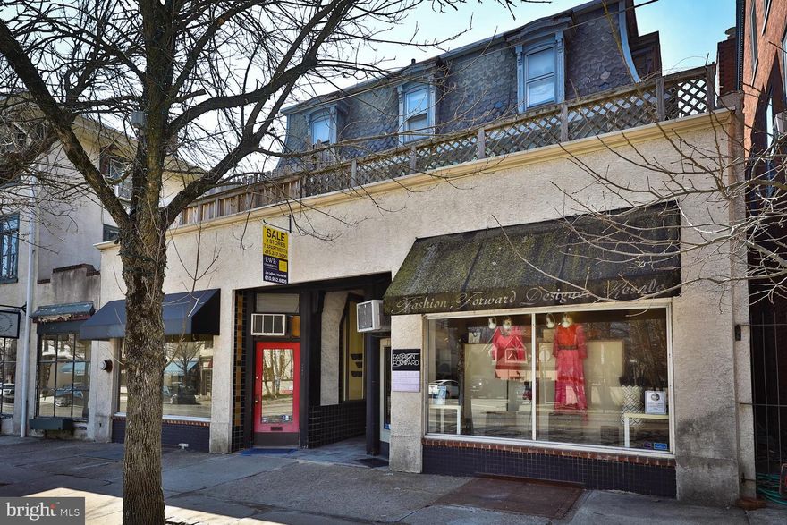 7904-06 Germantown Avenue is an exceptional investment opportunity in the upscale neighborhood of Chestnut Hill in Philadelphia. The property consists of two buildings located on vibrant Germantown Avenue, the main business artery in the heart of one of the region’s most desirable go-to locations. Fronting  Germantown Avenue are two store fronts and five one-bedroom apartments. The rear building, formerly a garage,   is approached from a driveway off Springfield Avenue, and contains two one-bedroom apartments.  The property has a steady income stream with a historically very low vacancy rate.  This factor offers the sharp investor a chance to formulate and achieve the highest and best use of the property, your vision, while maintaining a constant income stream. Most apartments have hardwood floors, high ceilings and great natural light. Particularly appealing to tenants,  all but one have a private outdoor area, either a deck or patio. One apartment has its own parking space. The currently occupied store is rented to an upscale resale clothing business. The other store in the past was variously a retail tile store, a dentist's office and a retail plant store. Current rents are low with comparable Chestnut Hill properties and the opportunity for increased income is high. The property is currently zoned two commercial spaces and for 5 residential apartments. Chestnut Hill hosts a wide variety of restaurants, boutique shops, two brew pubs and an upscale boutique hotel, all of which draw  high foot traffic all year long to Germantown Ave. Retail exposure is well established in Chestnut Hill. The Avenue has a Fresh Market Grocery Store and a Weavers Way Coop Store. Two highly attended seasonal outdoor festivals occur each year, the Springtime Home and Garden Festival and Autumn Fall for the Arts Festival which bring in thousands of shoppers, revelers, and foodies to the Avenue. Restaurant Week  in August, Clover Outdoor Markets, Halloween on the Hill, Stag and Doe Shopping before Christmas are just some of the strong pulls to local businesses.  There is a very active Chestnut Hill Business Association. Surrounding Chestnut Hill is the vast City Park System with miles of hiking and biking trails, Morris Arboretum and Chestnut Hill College among many other points of interest. Come see this property on the Avenue in Chestnut Hill for a wonderful chance to be part of the Avenue.